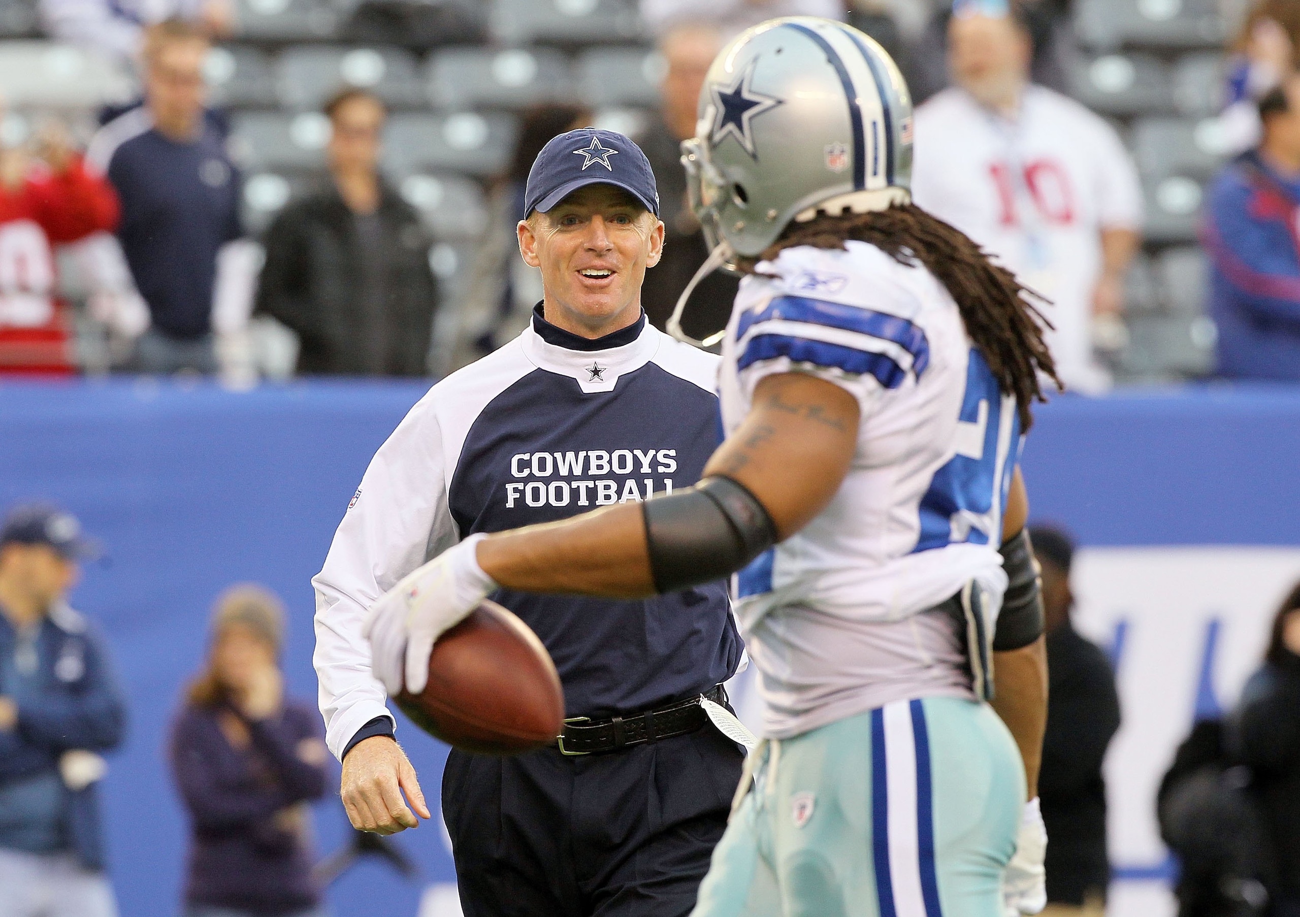 EAST RUTHERFORD, NJ - NOVEMBER 14:  Head coach Jason Garrett of the Dallas Cowboys talks with Marion Barber #24 as his team warms up prior to playing against the New York Giants on November 14, 2010 at the New Meadowlands Stadium in East Rutherford, New J
