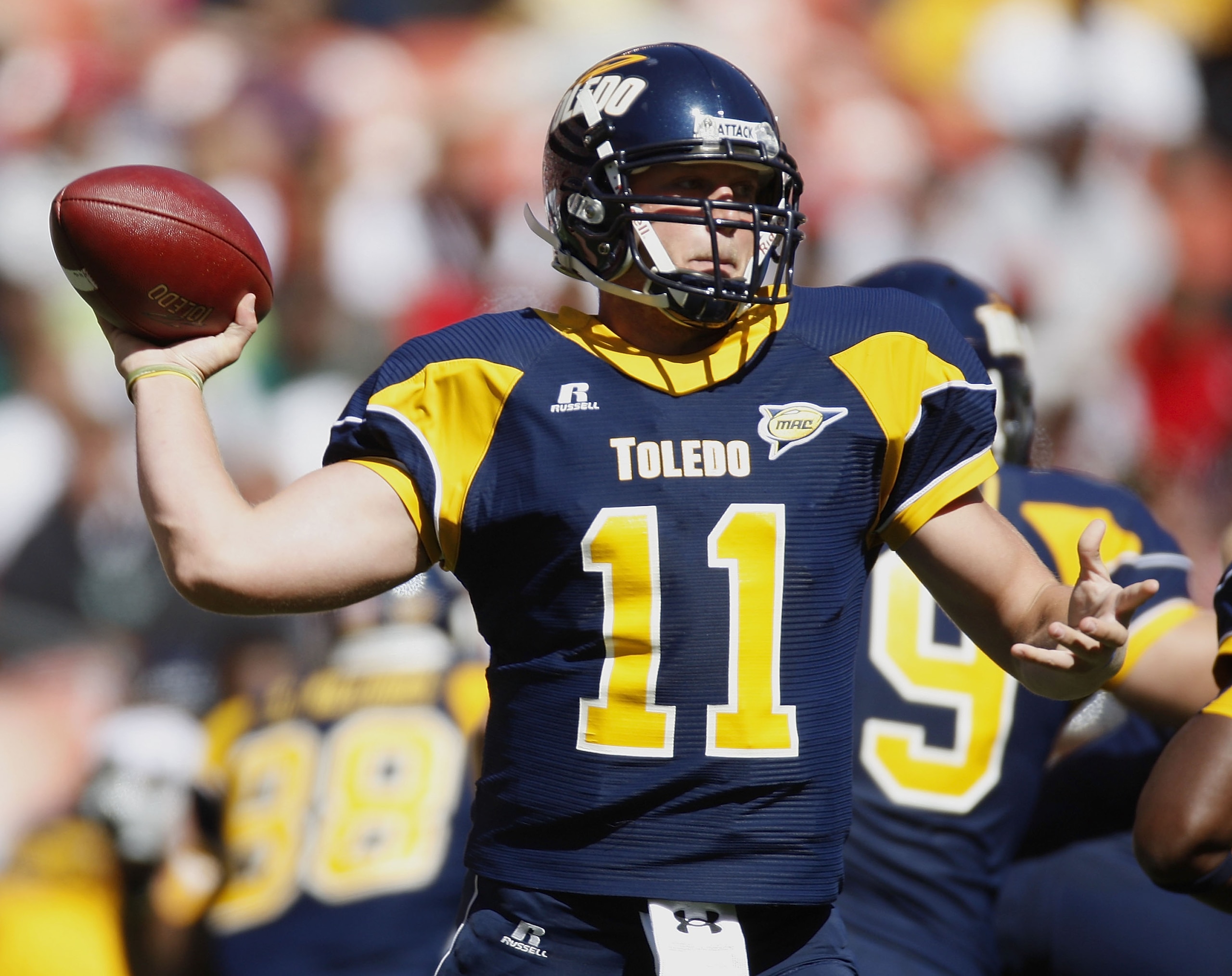 CLEVELAND - SEPTEMBER 19: Aaron Opelt #11 of the Toledeo Rockets throws a first quarter pass while playing the Ohio State Buckeyes on September 19, 2009 at Cleveland Browns Stadium in Cleveland, Ohio.  (Photo by Gregory Shamus/Getty Images)