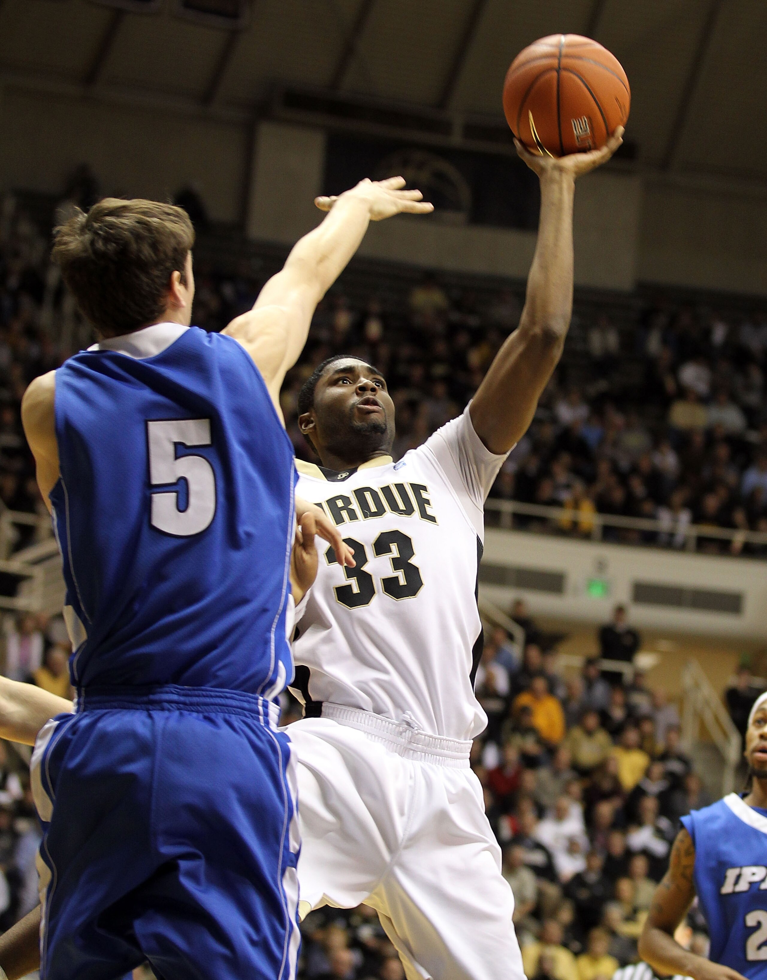 WEST LAFAYETTE, IN - DECEMBER 21: E ' Twaun Moore #33 of the Purdue Boilermakers shoots the ball while defended by Jason Smeathers #10 of the IPFW Mastodons during the game at Mackey Arena on December 21, 2010 in West Lafayette, Indiana. (Photo by Andy WEST LAFAYETTE, IN - DECEMBER 21: E ' Twaun Moore #33 of the Purdue Boilermakers shoots the ball while defended by Jason Smeathers #10 of the IPFW Mastodons during the game at Mackey Arena on December 21, 2010 in West Lafayette, Indiana. (Photo by Andy