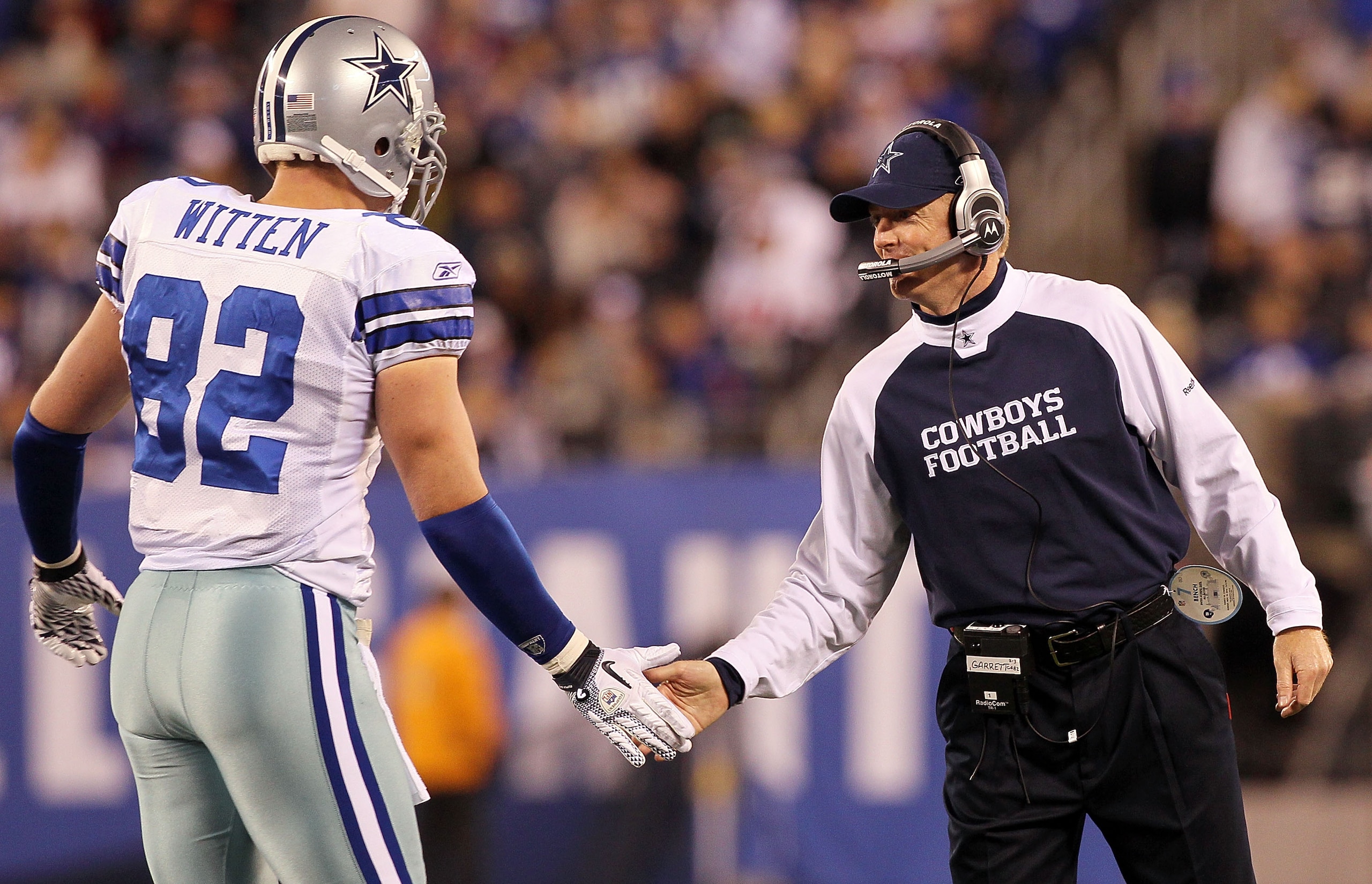 EAST RUTHERFORD, NJ - NOVEMBER 14:  Head coach Jason Garrett of the Dallas Cowboys celebrates a play against the New York Giants with Jason Witten #82 on November 14, 2010 at the New Meadowlands Stadium in East Rutherford, New Jersey.  (Photo by Jim McIsa