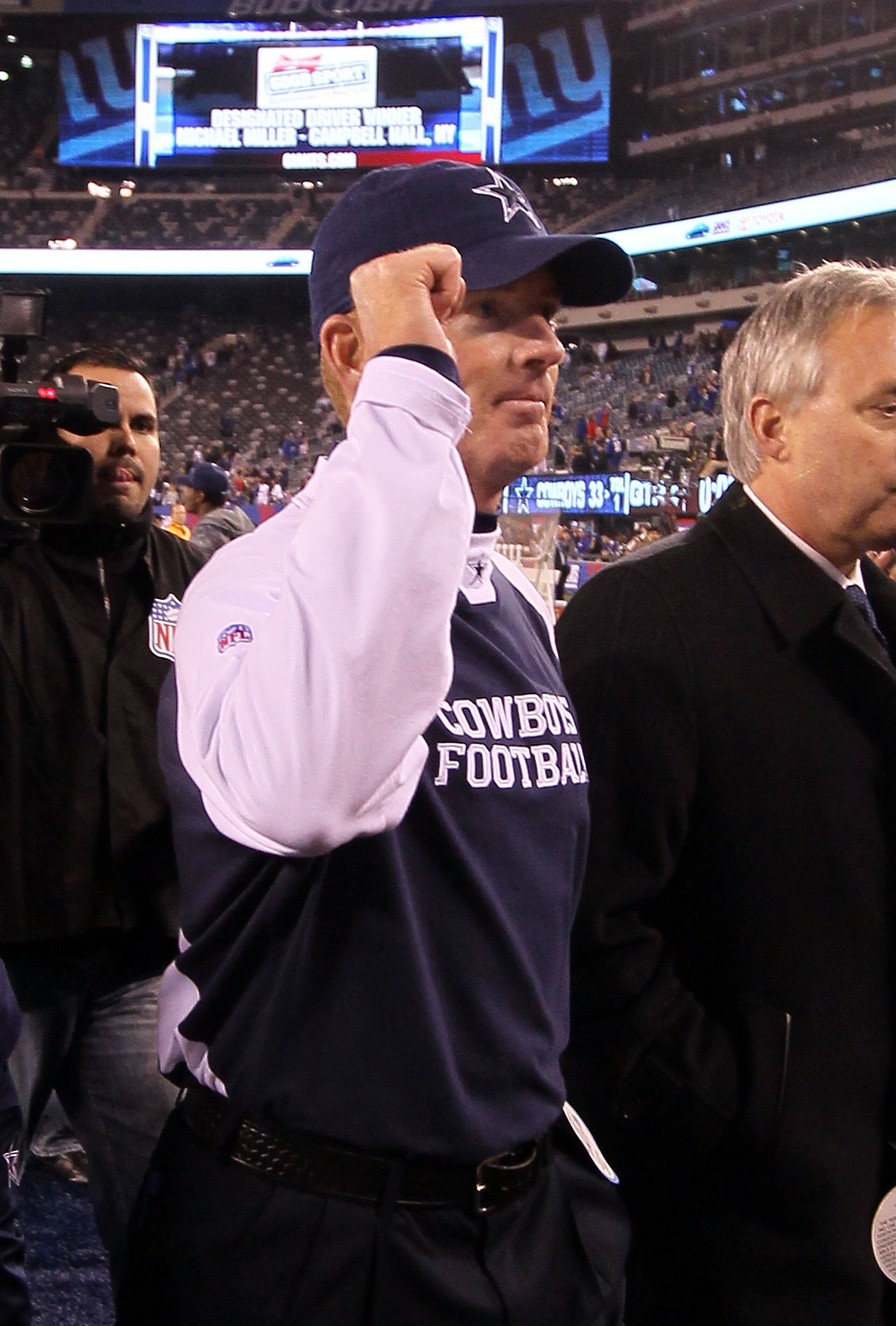 EAST RUTHERFORD, NJ - NOVEMBER 14: Head coach Jason Garrett of the Dallas Cowboys celebrates as he walks off the field after defeating the New York Giants on November 14, 2010 at the New Meadowlands Stadium in East Rutherford, New Jersey. The Cowboys defe