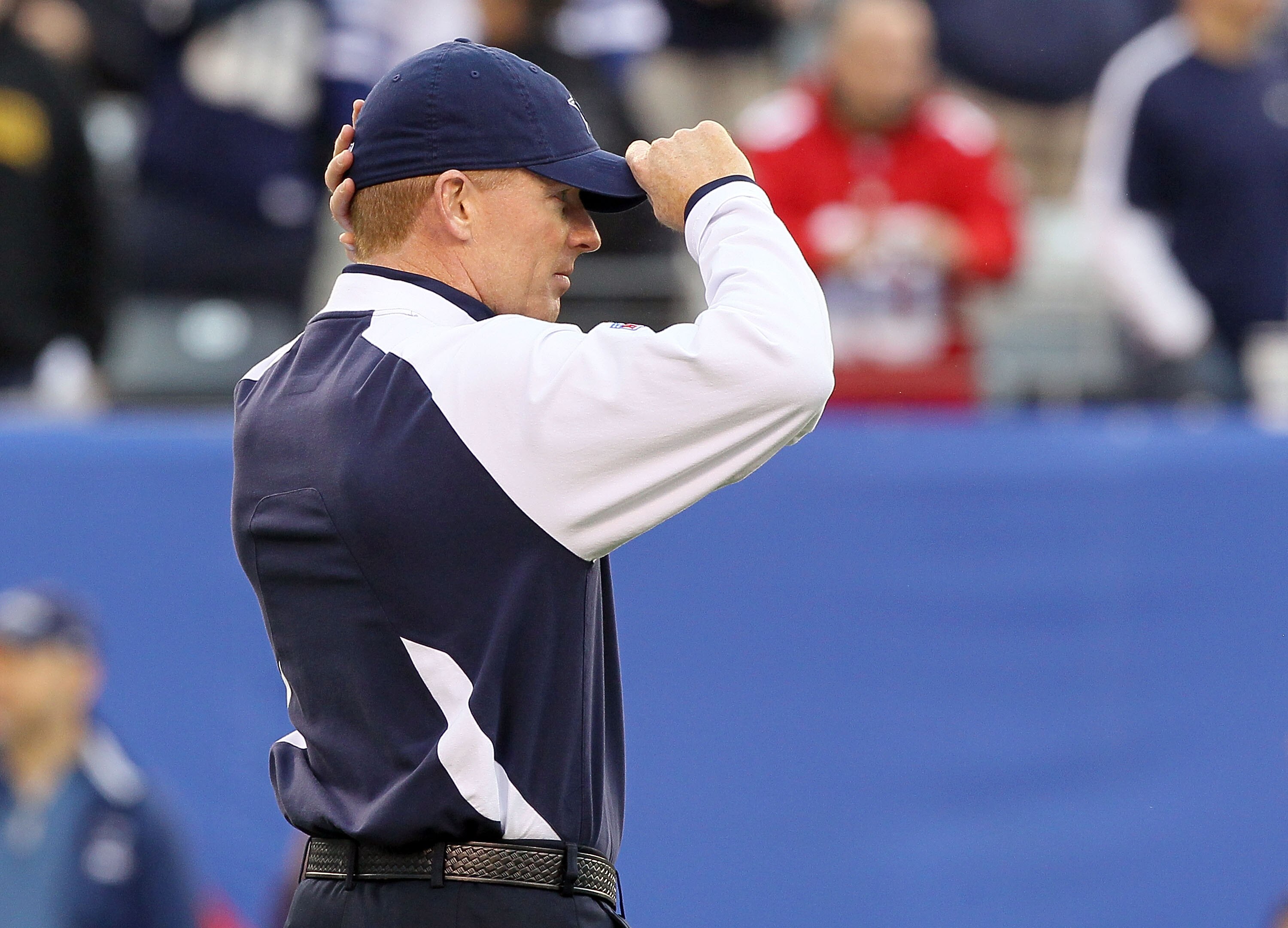 EAST RUTHERFORD, NJ - NOVEMBER 14:  Head coach Jason Garrett of the Dallas Cowboys looks on as his team warms up prior to playing against the New York Giants on November 14, 2010 at the New Meadowlands Stadium in East Rutherford, New Jersey.  (Photo by Ji