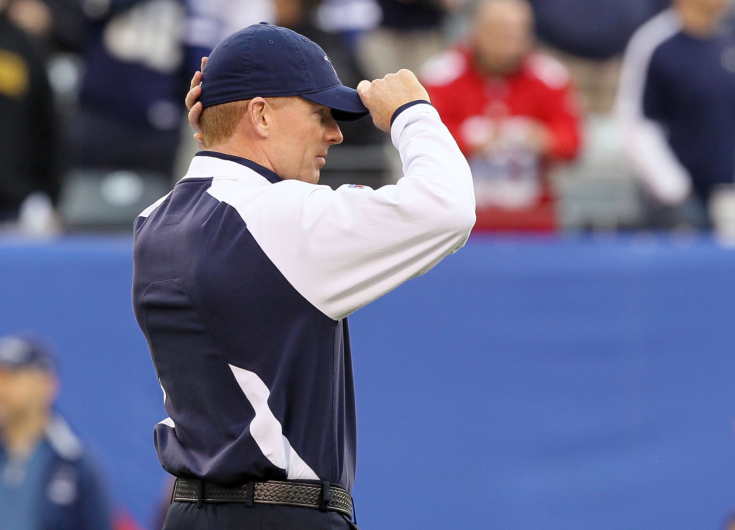 EAST RUTHERFORD, NJ - NOVEMBER 14:  Head coach Jason Garrett of the Dallas Cowboys looks on as his team warms up prior to playing against the New York Giants on November 14, 2010 at the New Meadowlands Stadium in East Rutherford, New Jersey.  (Photo by Ji
