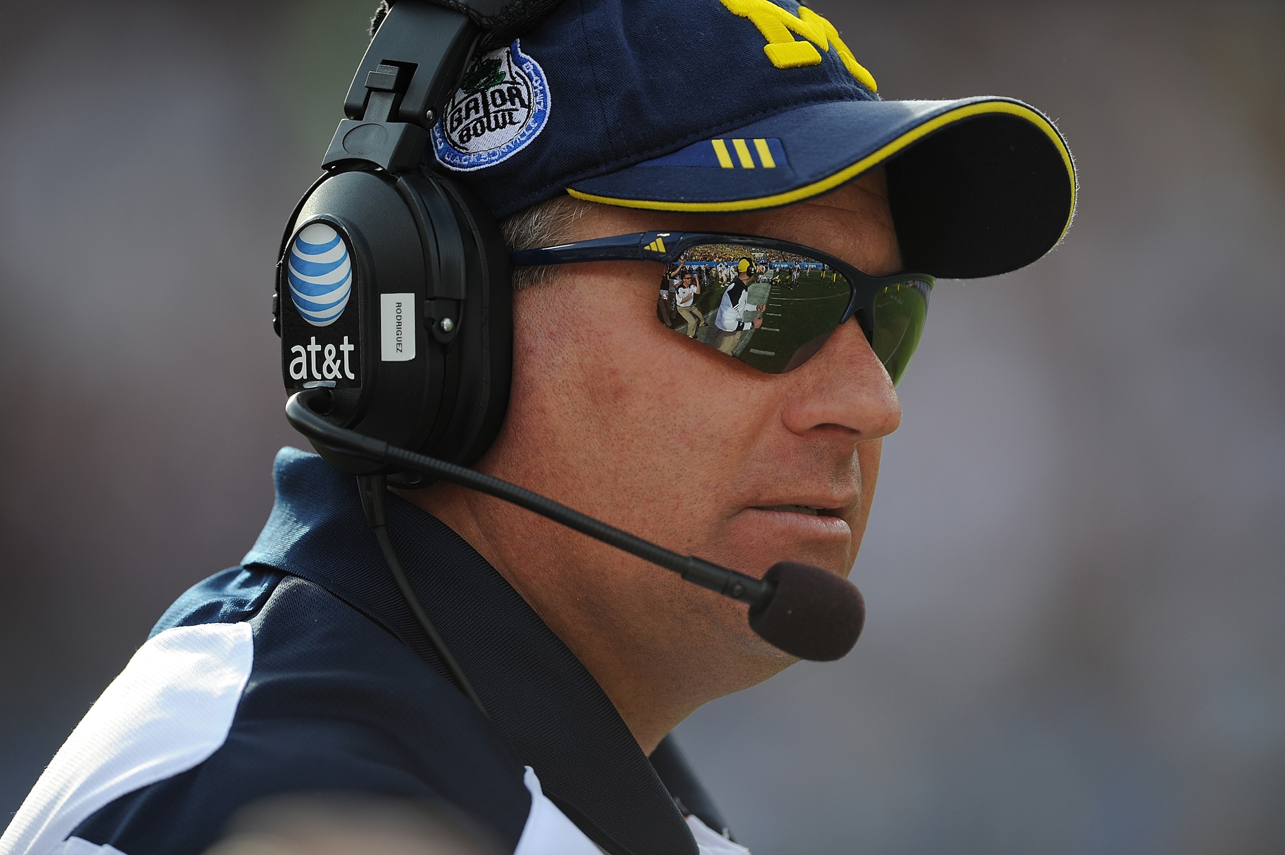 JACKSONVILLE, FL - JANUARY 01: Head Coach Rich Rodriguez of the University of Michigan Wolverines during the Gator Bowl at EverBank Field on January 1, 2011 in Jacksonville, Florida (Photo by Rick Dole/Getty Images) JACKSONVILLE, FL - JANUARY 01: Head Coach Rich Rodriguez of the University of Michigan Wolverines during the Gator Bowl at EverBank Field on January 1, 2011 in Jacksonville, Florida (Photo by Rick Dole/Getty Images)