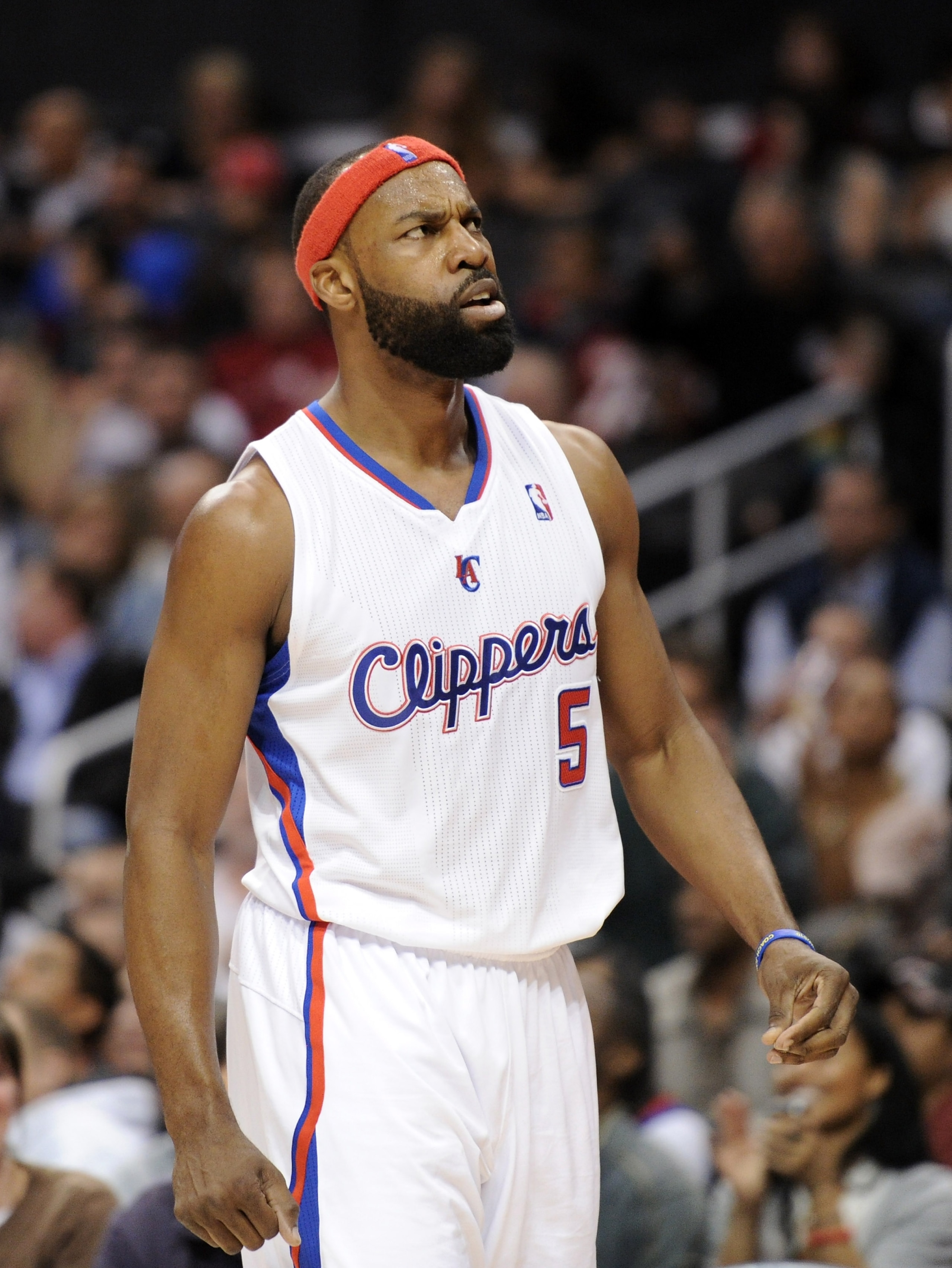 LOS ANGELES, CA - DECEMBER 01:  Baron Davis #5 of the Los Angeles Clippers reacts on defense against the San Antonio Spurs at the Staples Center on December 1, 2010 in Los Angeles, California.  NOTE TO USER: User expressly acknowledges and agrees that, by
