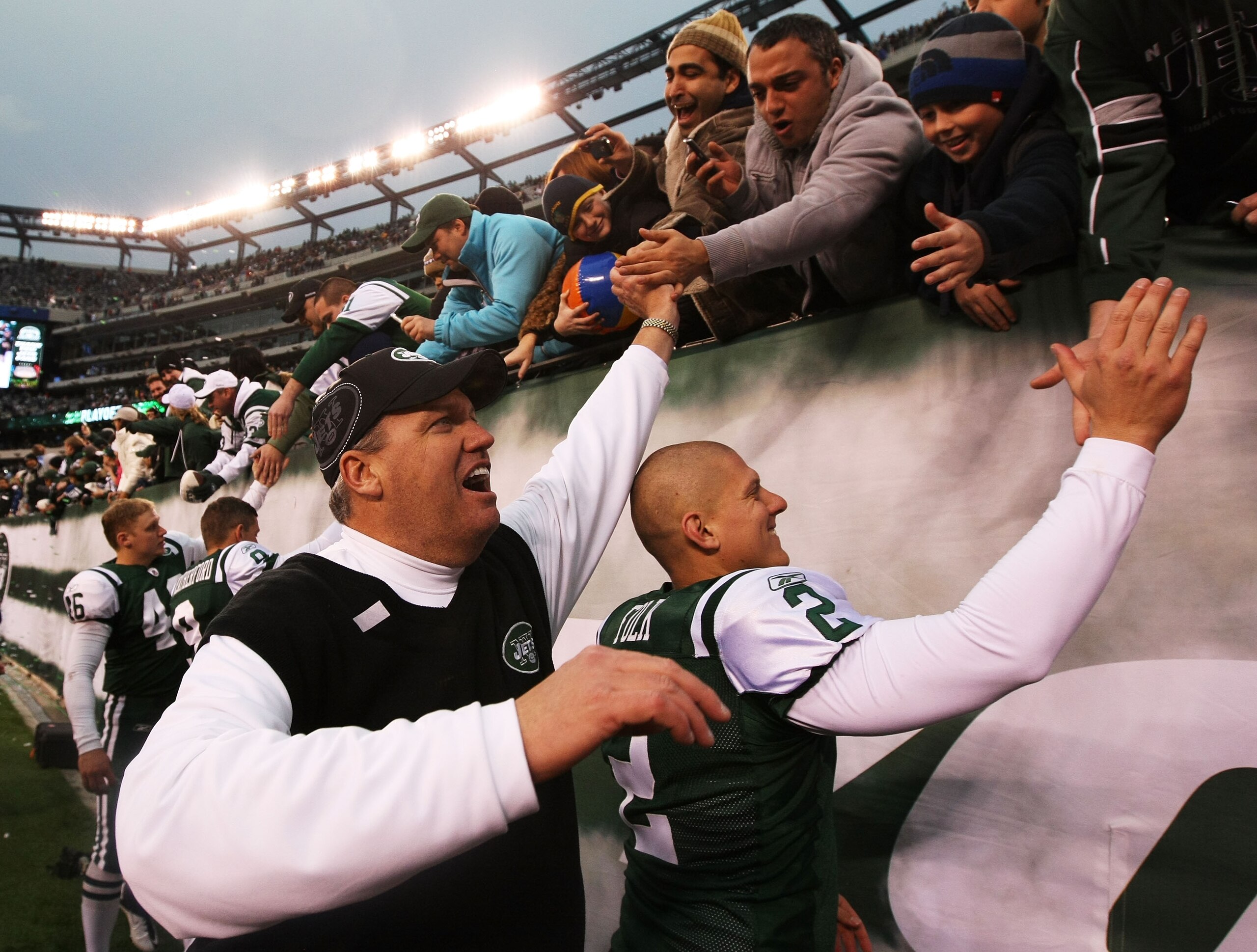EAST RUTHERFORD, NJ - JANUARY 02: Head coach Rex Ryan and Nick Folk #2 of the New York Jets celebrate with fans after they defeated the Buffalo Bills 38 to 7 at New Meadowlands Stadium on January 2, 2011 in East Rutherford, New Jersey. (Photo by Al Bell EAST RUTHERFORD, NJ - JANUARY 02: Head coach Rex Ryan and Nick Folk #2 of the New York Jets celebrate with fans after they defeated the Buffalo Bills 38 to 7 at New Meadowlands Stadium on January 2, 2011 in East Rutherford, New Jersey. (Photo by Al Bell
