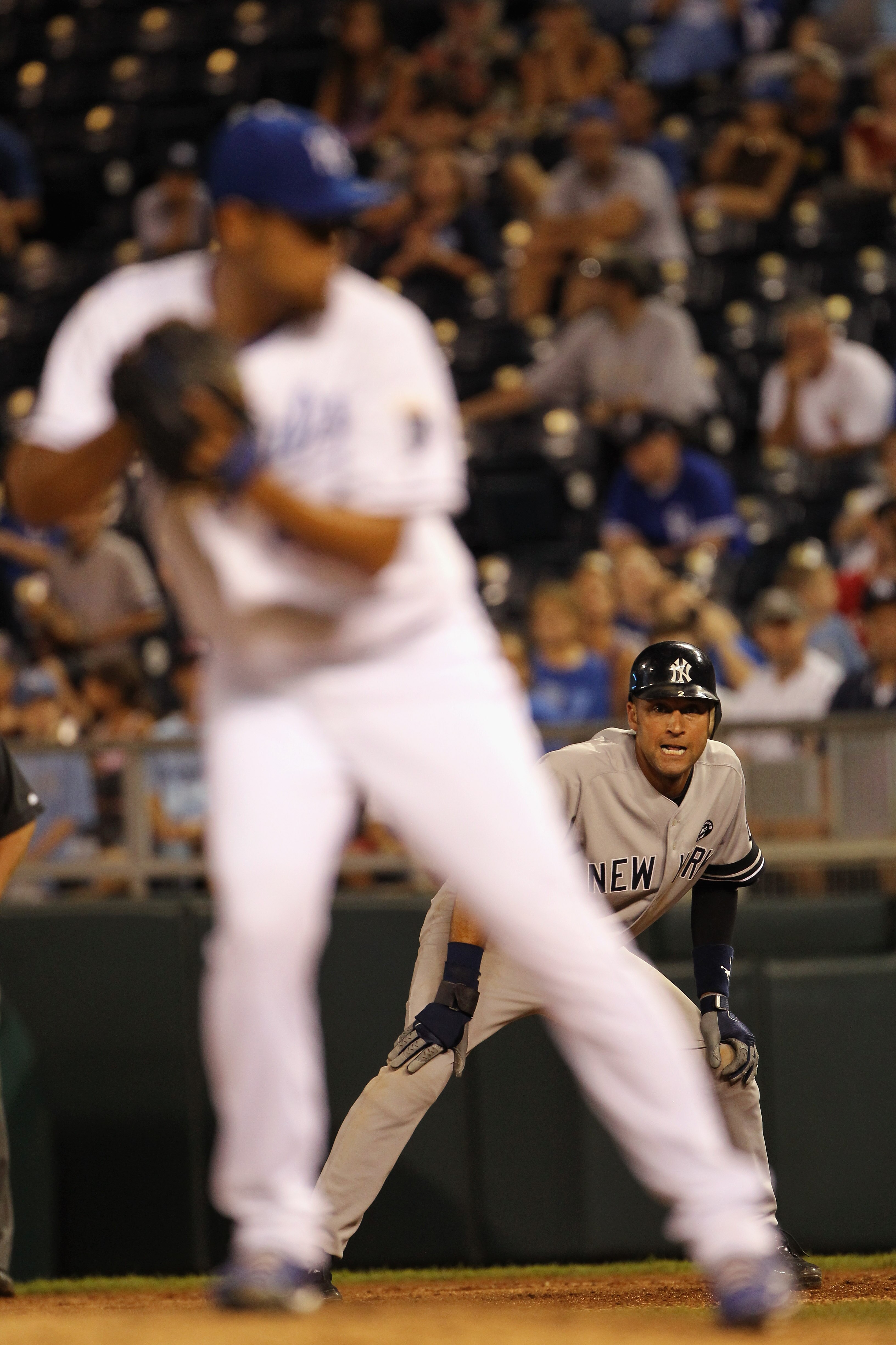 KANSAS CITY, MO - AUGUST 13:  Derek Jeter #2 of the New York Yankees watches pitcher Joakim Soria #48 of the Kansas City Royals from first base during the game on August 13, 2010 at Kauffman Stadium in Kansas City, Missouri.  (Photo by Jamie Squire/Getty