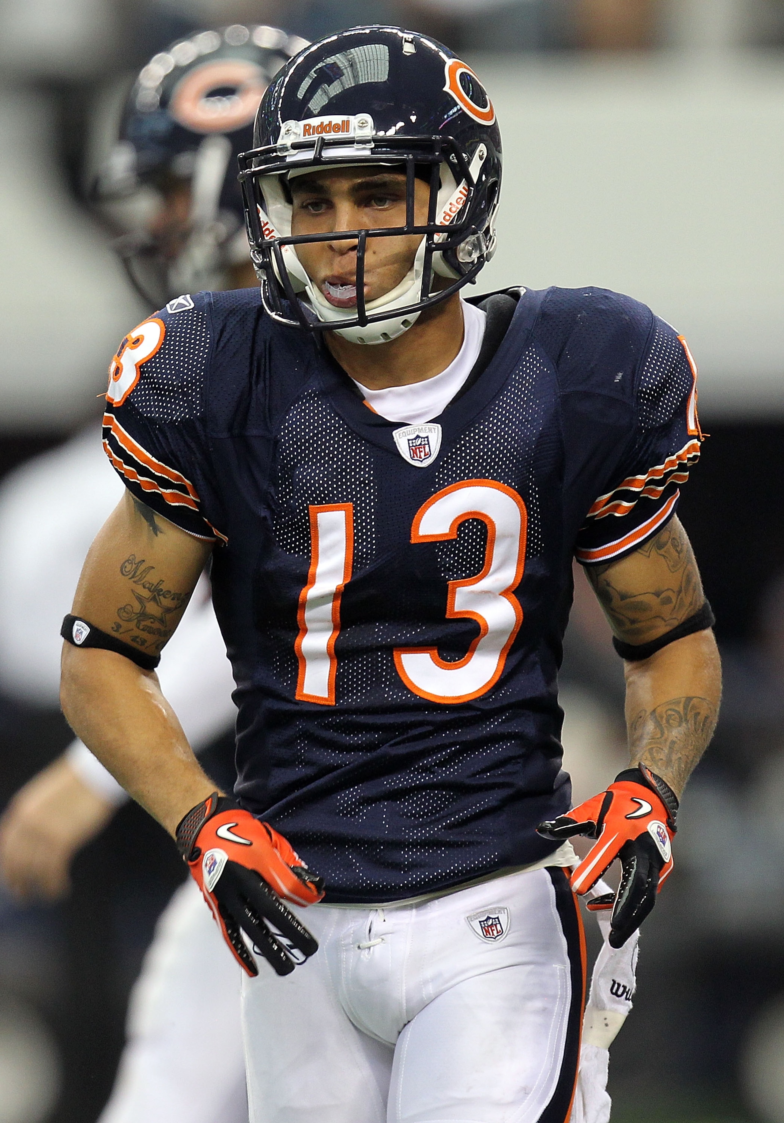ARLINGTON, TX - SEPTEMBER 19:  Wide receiver Johnny Knox #13 of the Chicago Bears runs the ball against the Dallas Cowboys at Cowboys Stadium on September 19, 2010 in Arlington, Texas.  (Photo by Ronald Martinez/Getty Images)