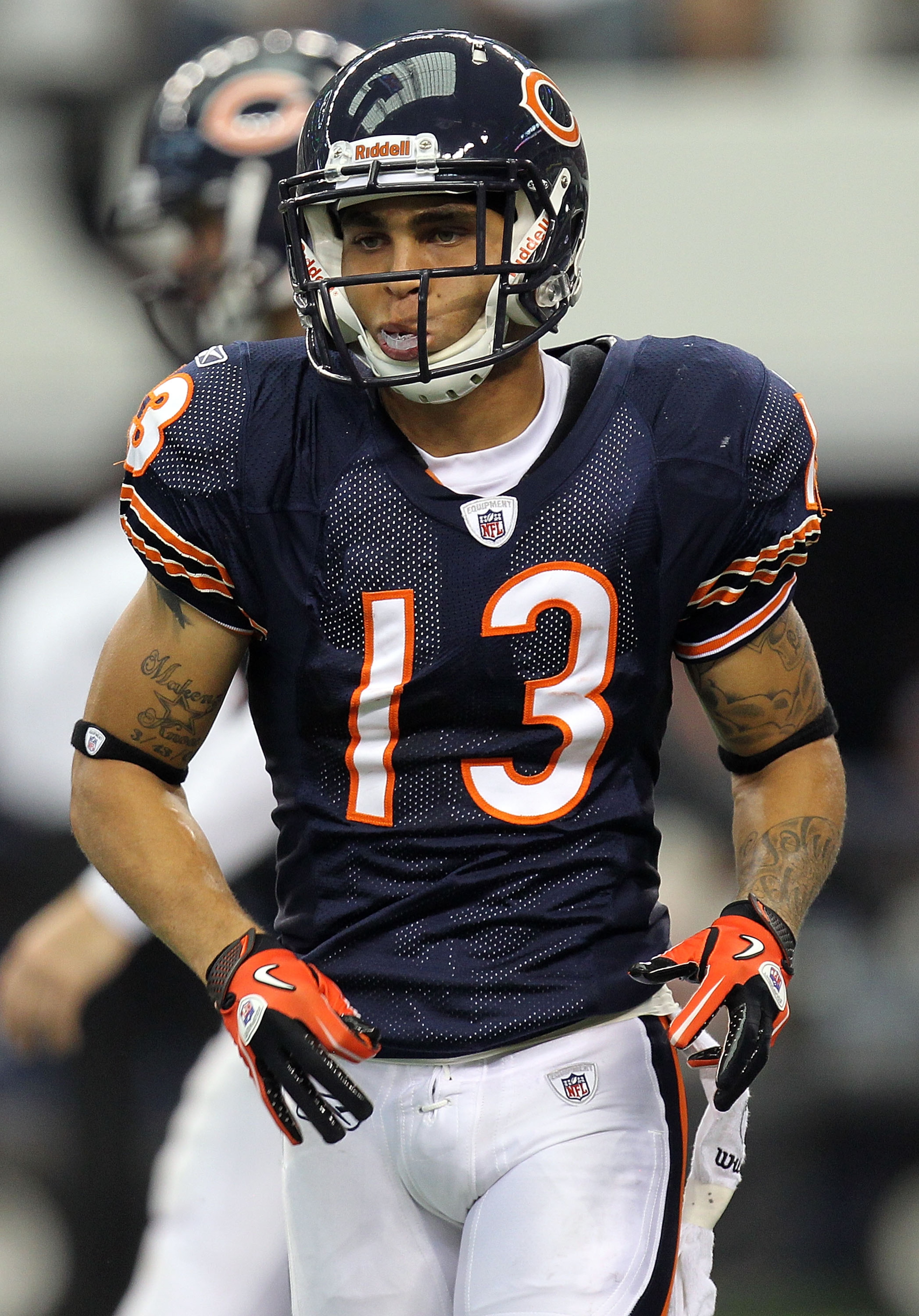 ARLINGTON, TX - SEPTEMBER 19:  Wide receiver Johnny Knox #13 of the Chicago Bears runs the ball against the Dallas Cowboys at Cowboys Stadium on September 19, 2010 in Arlington, Texas.  (Photo by Ronald Martinez/Getty Images)