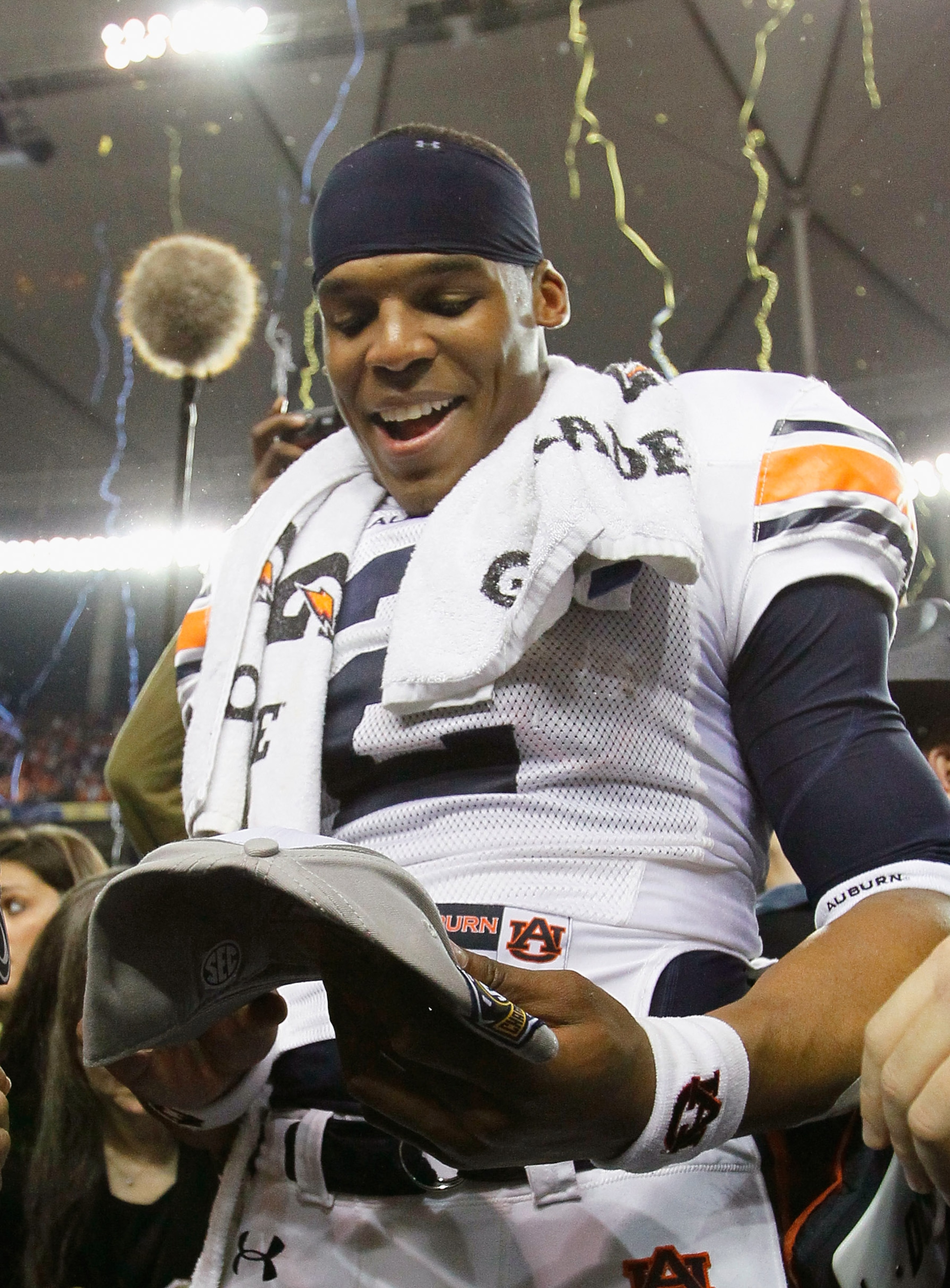 ATLANTA, GA - DECEMBER 04:  Quarterback Cam Newton #2 of the Auburn Tigers celebrates after their 56-17 win over the South Carolina Gamecocks during the 2010 SEC Championship at Georgia Dome on December 4, 2010 in Atlanta, Georgia.  (Photo by Kevin C. Cox