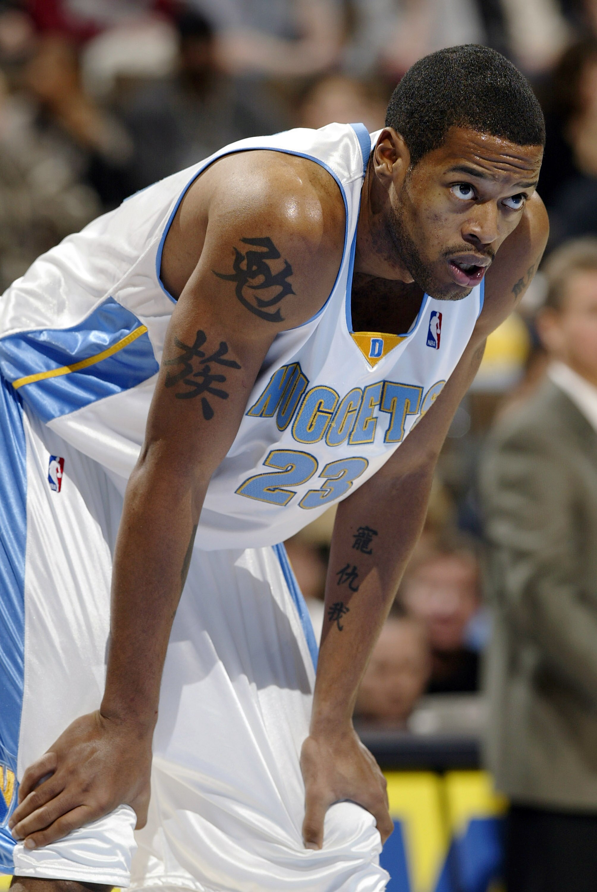 DENVER - JANUARY 9:  Marcus Camby #23 of the Denver Nuggets waits for a free throw in a game against the Utah Jazz January 9, 2004 at the Pepsi Center in Denver, Colorado.  Camby had eight blocked shots to go with 11 rebounds and eight points in the Nugge