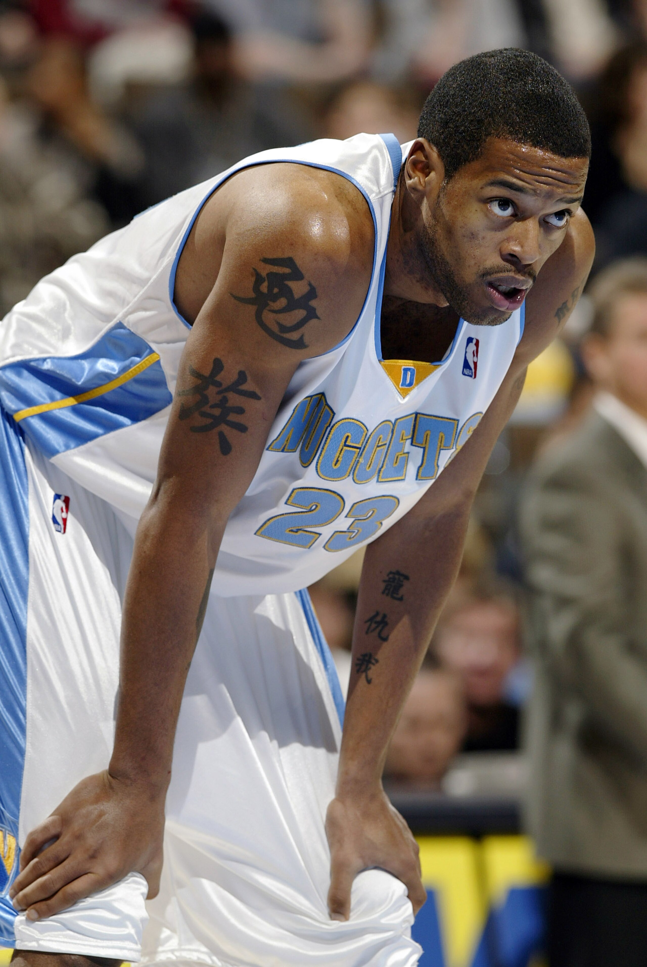 DENVER - JANUARY 9:  Marcus Camby #23 of the Denver Nuggets waits for a free throw in a game against the Utah Jazz January 9, 2004 at the Pepsi Center in Denver, Colorado.  Camby had eight blocked shots to go with 11 rebounds and eight points in the Nugge