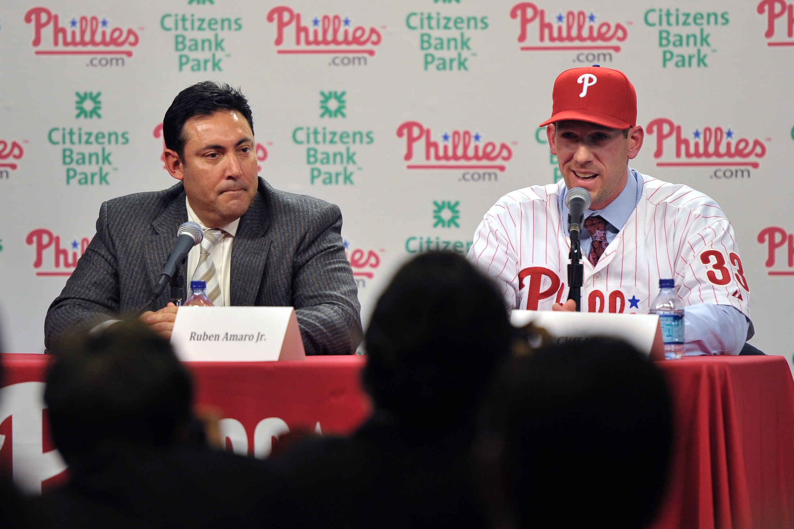 PHILADELPHIA - DECEMBER 15: Pitcher Cliff Lee #33 of the Philadelphia Phillies talks with the media while general manager Ruben Amaro Jr. (L) watches during a press conference at Citizens Bank Park on December 15, 2010 in Philadelphia, Pennsylvania. (Phot PHILADELPHIA - DECEMBER 15: Pitcher Cliff Lee #33 of the Philadelphia Phillies talks with the media while general manager Ruben Amaro Jr. (L) watches during a press conference at Citizens Bank Park on December 15, 2010 in Philadelphia, Pennsylvania. (Phot