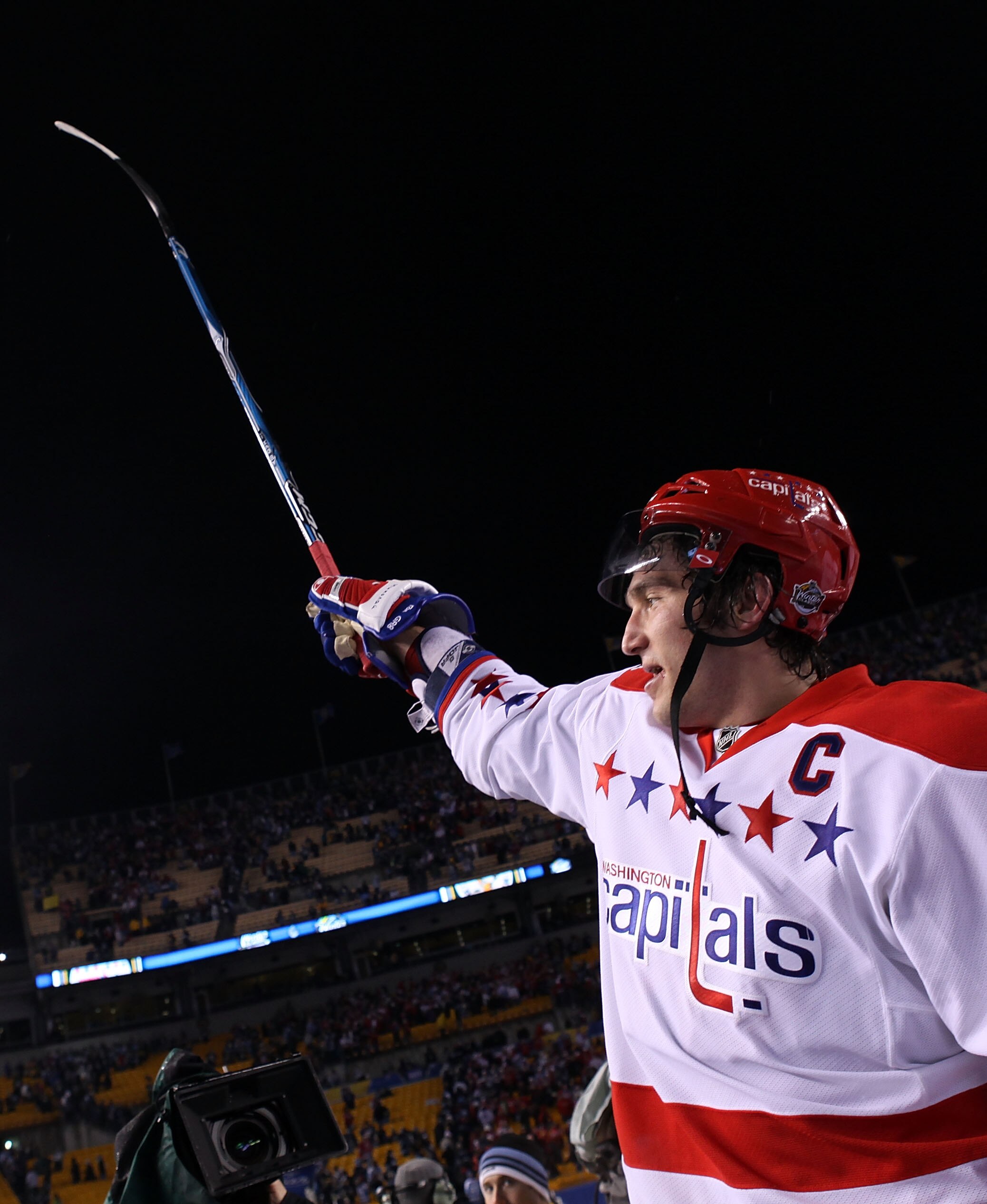 PITTSBURGH, PA - JANUARY 01:  Alex Ovechkin #8 of the Washington Capitals celebrates their 3-1 victory over the Pittsburgh Penguins during the 2011 NHL Bridgestone Winter Classic at Heinz Field on January 1, 2011 in Pittsburgh, Pennsylvania.  (Photo by Ja