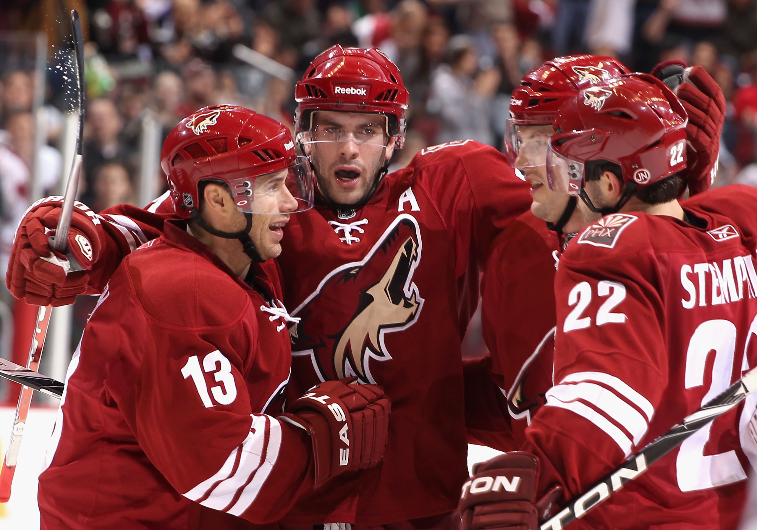 GLENDALE, AZ - DECEMBER 29:  Ray Whitney #13, Keith Yandle #3, Shane Doan #19 and Lee Stempniak #22 of the Phoenix Coyotes celebrate after Doan scored a second period power play goal against the Los Angeles Kings during the NHL game at Jobing.com Arena on