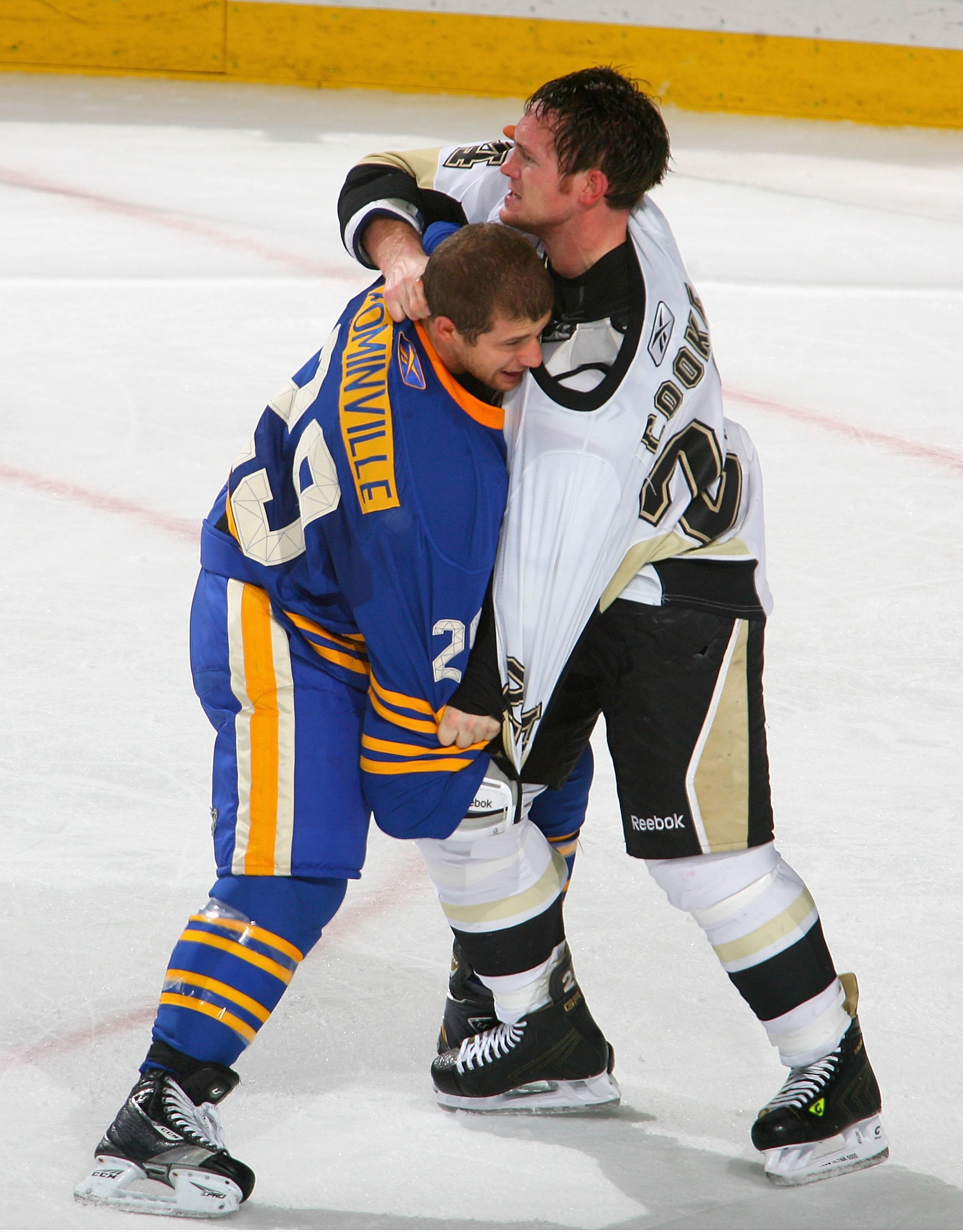 BUFFALO, NY - DECEMBER 11:  Jason Pominville #29 of the Buffalo Sabres fights with  Matt Cooke #24 of the Pittsburgh Penguins at HSBC Arena on December 11, 2010 in Buffalo, New York. Pittsburgh won 5-2.  (Photo by Rick Stewart/Getty Images)