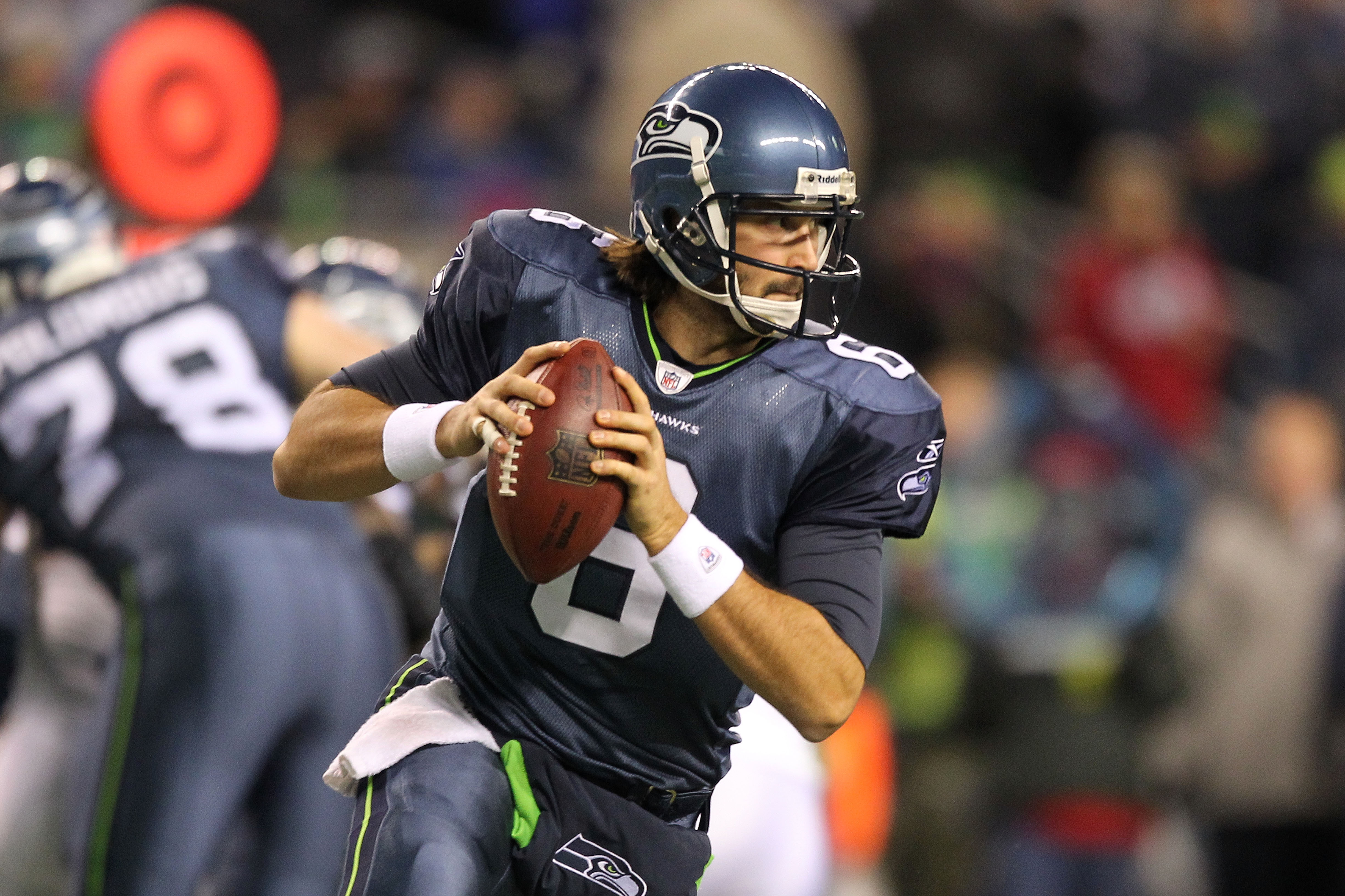SEATTLE, WA - JANUARY 02:  Quarterback Charlie Whitehurst #6 of the Seattle Seahawks looks to pass during their game against the St. Louis Rams at Qwest Field on January 2, 2011 in Seattle, Washington.  (Photo by Otto Greule Jr/Getty Images)