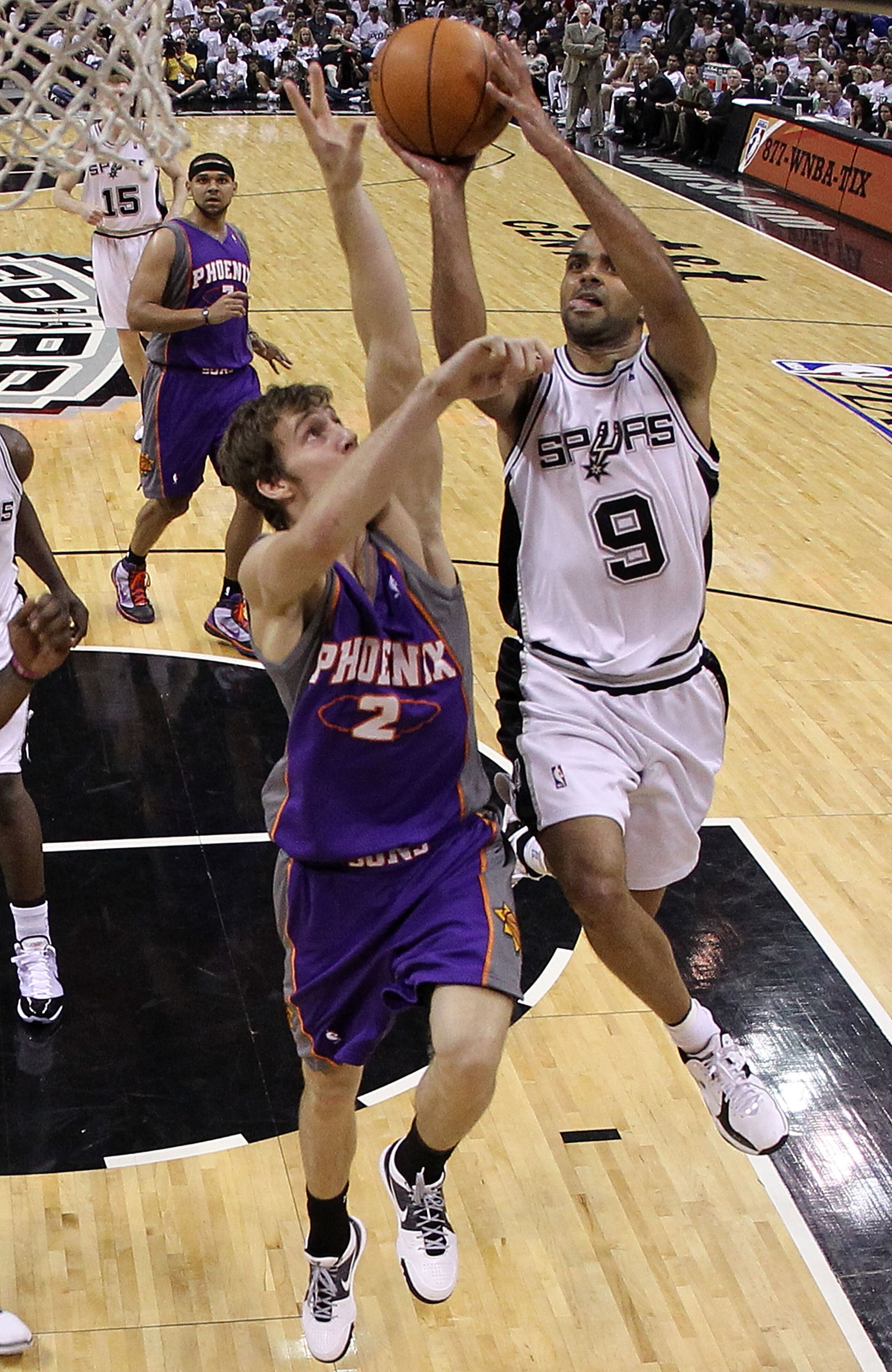 SAN ANTONIO - MAY 07:  Guard Tony Parker #9 of the San Antonio Spurs takes a shot against Goran Dragic #2 of the Phoenix Suns in Game Three of the Western Conference Semifinals during the 2010 NBA Playoffs at AT&T Center on May 7, 2010 in San Antonio, Tex
