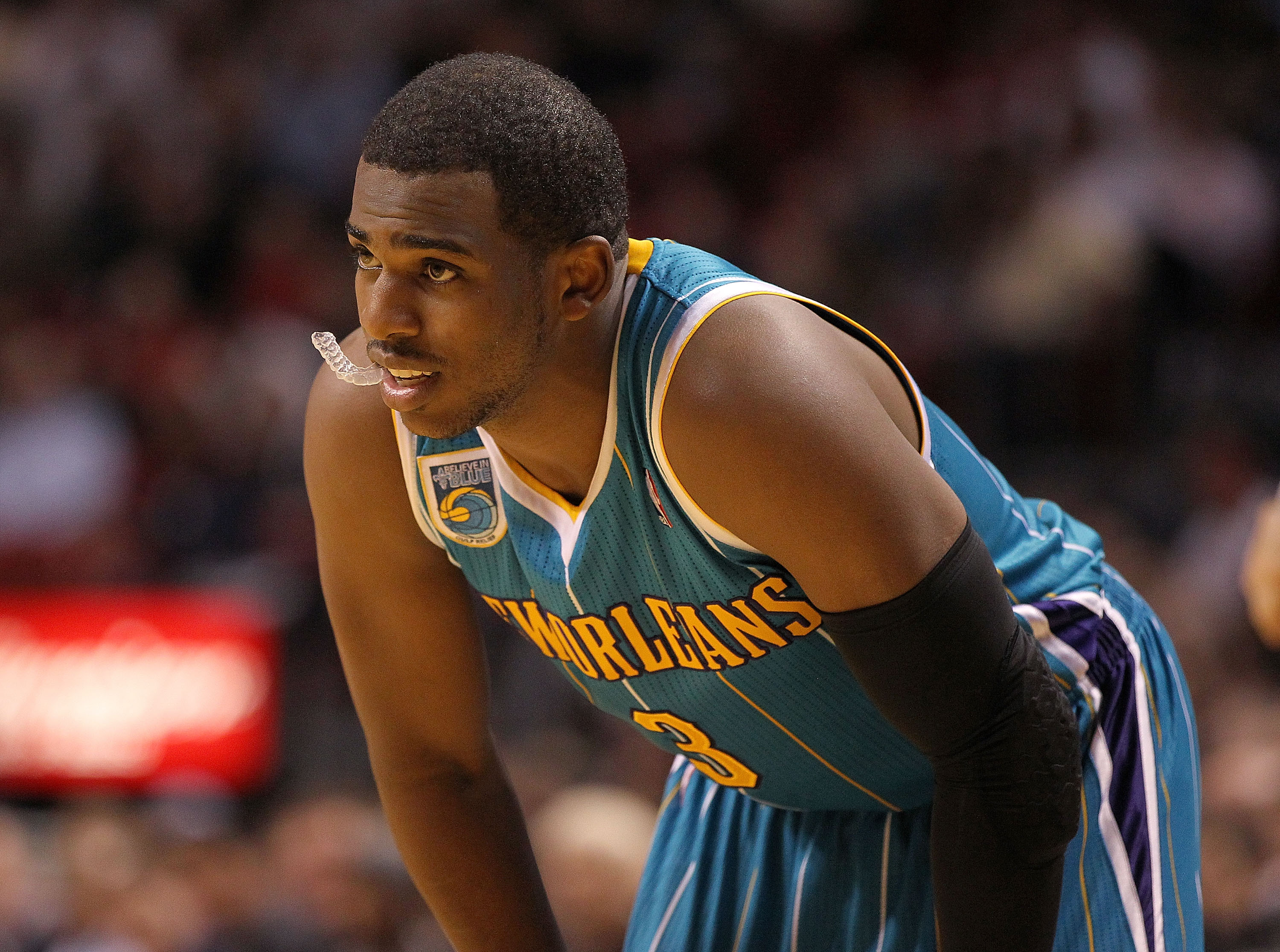 MIAMI, FL - DECEMBER 13: Chris Paul #3 of the New Orleans Hornets waits during a foul shot during a game against the Miami Heat at American Airlines Arena on December 13, 2010 in Miami, Florida. NOTE TO USER: User expressly acknowledges and agrees that, b