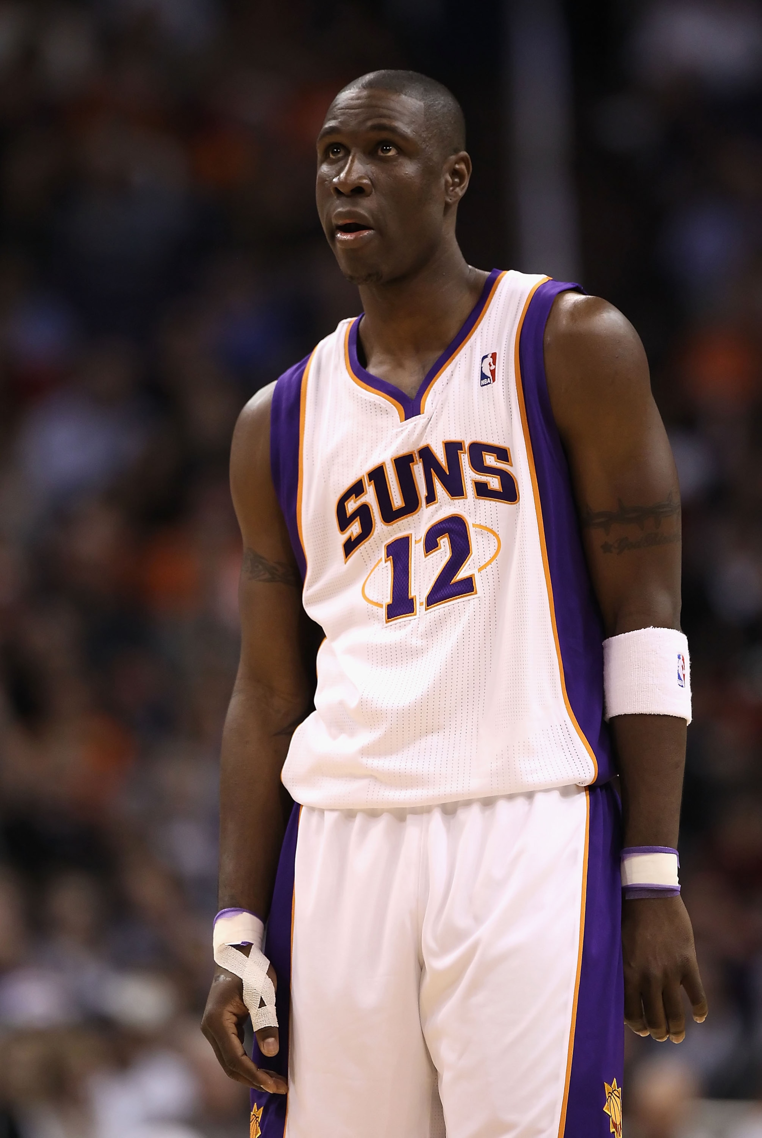 PHOENIX - DECEMBER 23:  Mickael Pietrus #12 of the Phoenix Suns during the NBA game against the Miami Heat at US Airways Center on December 23, 2010 in Phoenix, Arizona.  The Heat defeated the Suns 95-83.  NOTE TO USER: User expressly acknowledges and agr
