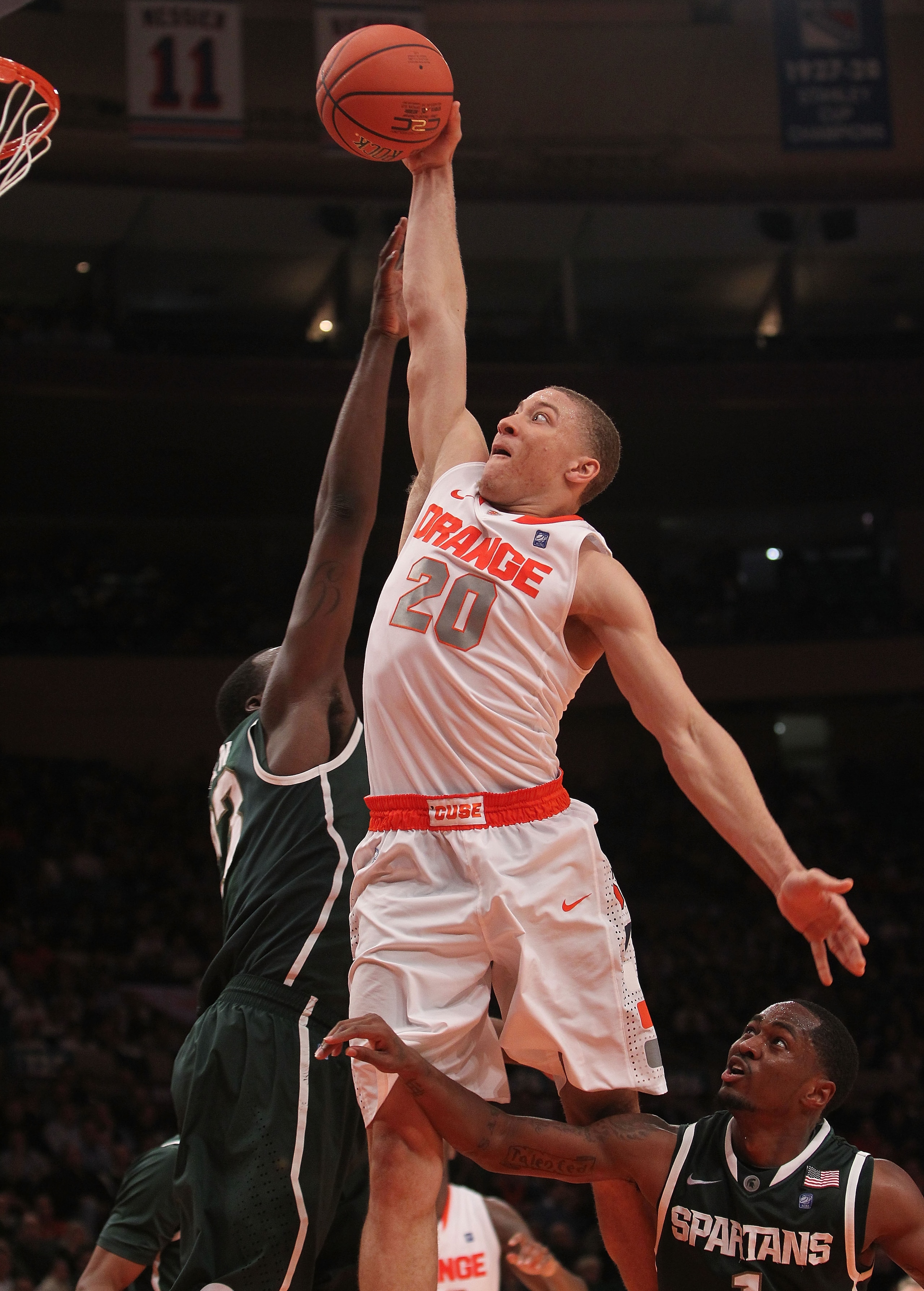 NEW YORK, NY - DECEMBER 07: Brandon Triche #30 of Syracuse Orange goes up for the dunk against the Michigan State Spartans during their game at the Jimmy V Classic at Madison Square Garden on December 7, 2010 in New York City. (Photo by Nick Laham/Getty NEW YORK, NY - DECEMBER 07: Brandon Triche #30 of Syracuse Orange goes up for the dunk against the Michigan State Spartans during their game at the Jimmy V Classic at Madison Square Garden on December 7, 2010 in New York City. (Photo by Nick Laham/Getty