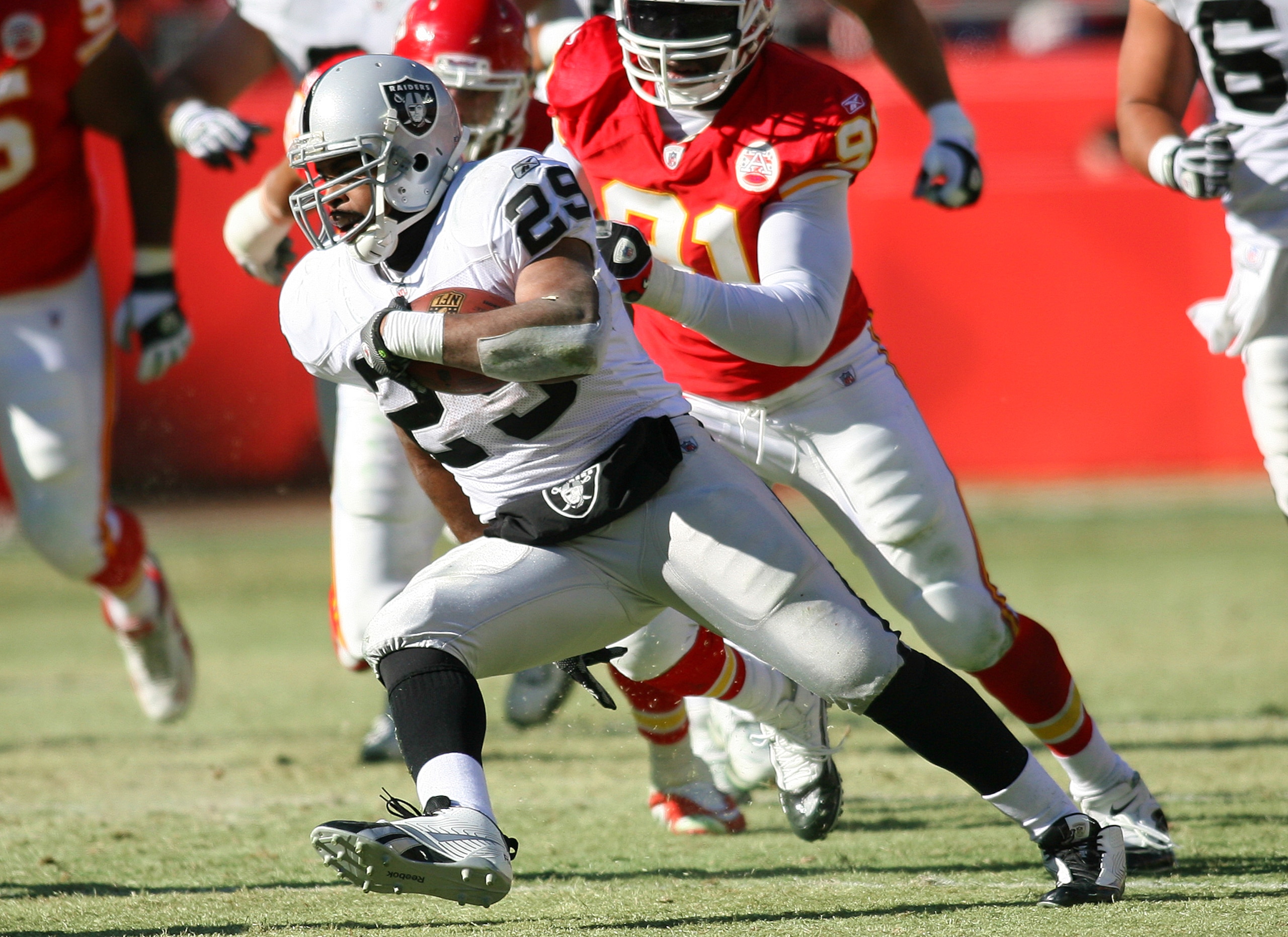 KANSAS CITY, MO - JANUARY 02: Running back Michael Bush #29 of the Oakland Raiders runs down field in a game against the Kansas City Chiefs at Arrowhead Stadium on January 2, 2011 in Kansas City, Missouri. (Photo by Tim Umphrey/Getty Images) KANSAS CITY, MO - JANUARY 02: Running back Michael Bush #29 of the Oakland Raiders runs down field in a game against the Kansas City Chiefs at Arrowhead Stadium on January 2, 2011 in Kansas City, Missouri. (Photo by Tim Umphrey/Getty Images)