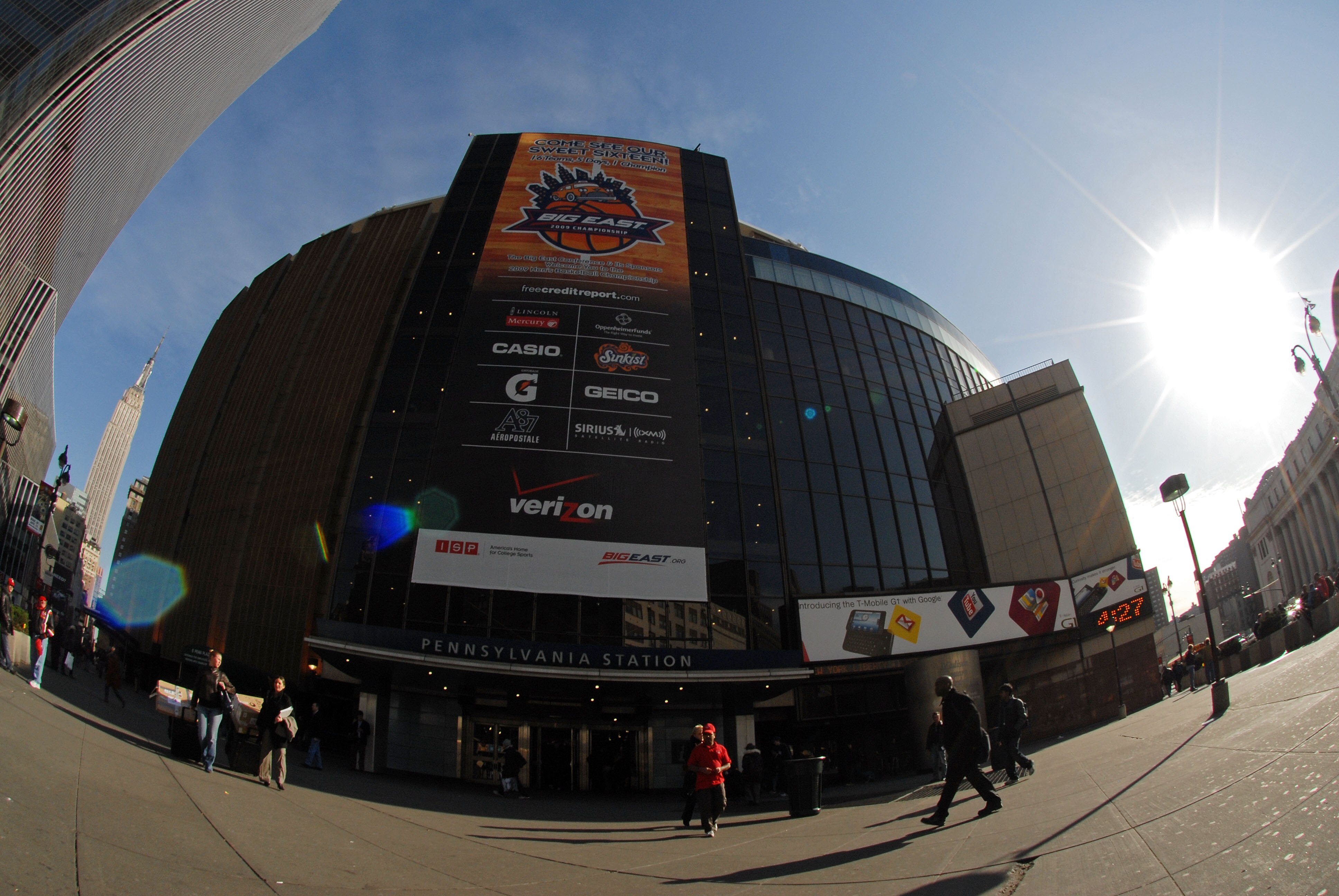 NEW YORK, NY - MARCH 13:  People walk outside of Madison Square Garden before the semifinal round of the Big East Tournament at Madison Square Garden on March 13, 2009 in New York City.  (Photo by Michael Heiman/Getty Images)