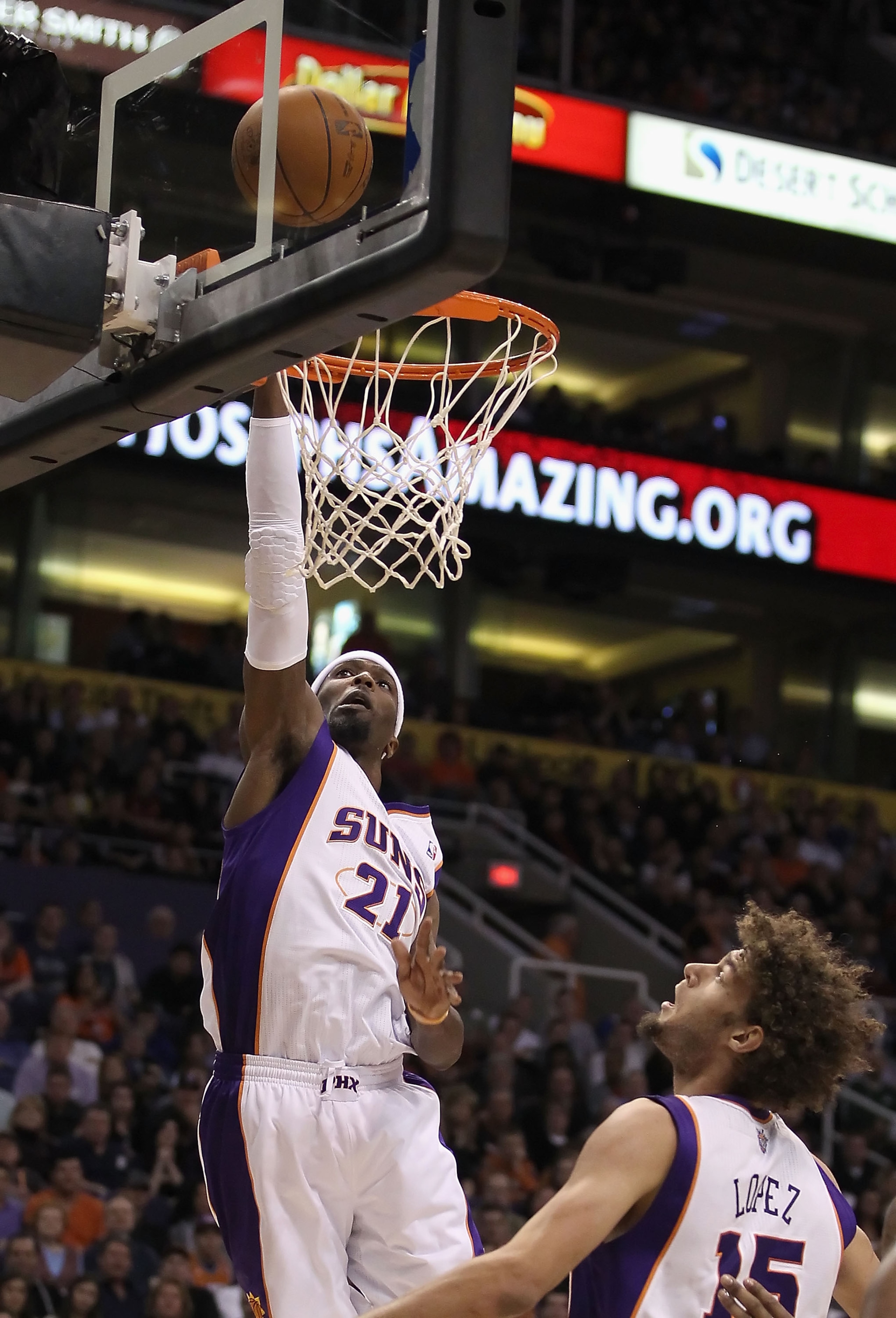 PHOENIX - DECEMBER 23:  Hakim Warrick #21 of the Phoenix Suns puts up a shot against the Miami Heat during the NBA game at US Airways Center on December 23, 2010 in Phoenix, Arizona. The Heat defeated the Suns 95-83. NOTE TO USER: User expressly acknowled