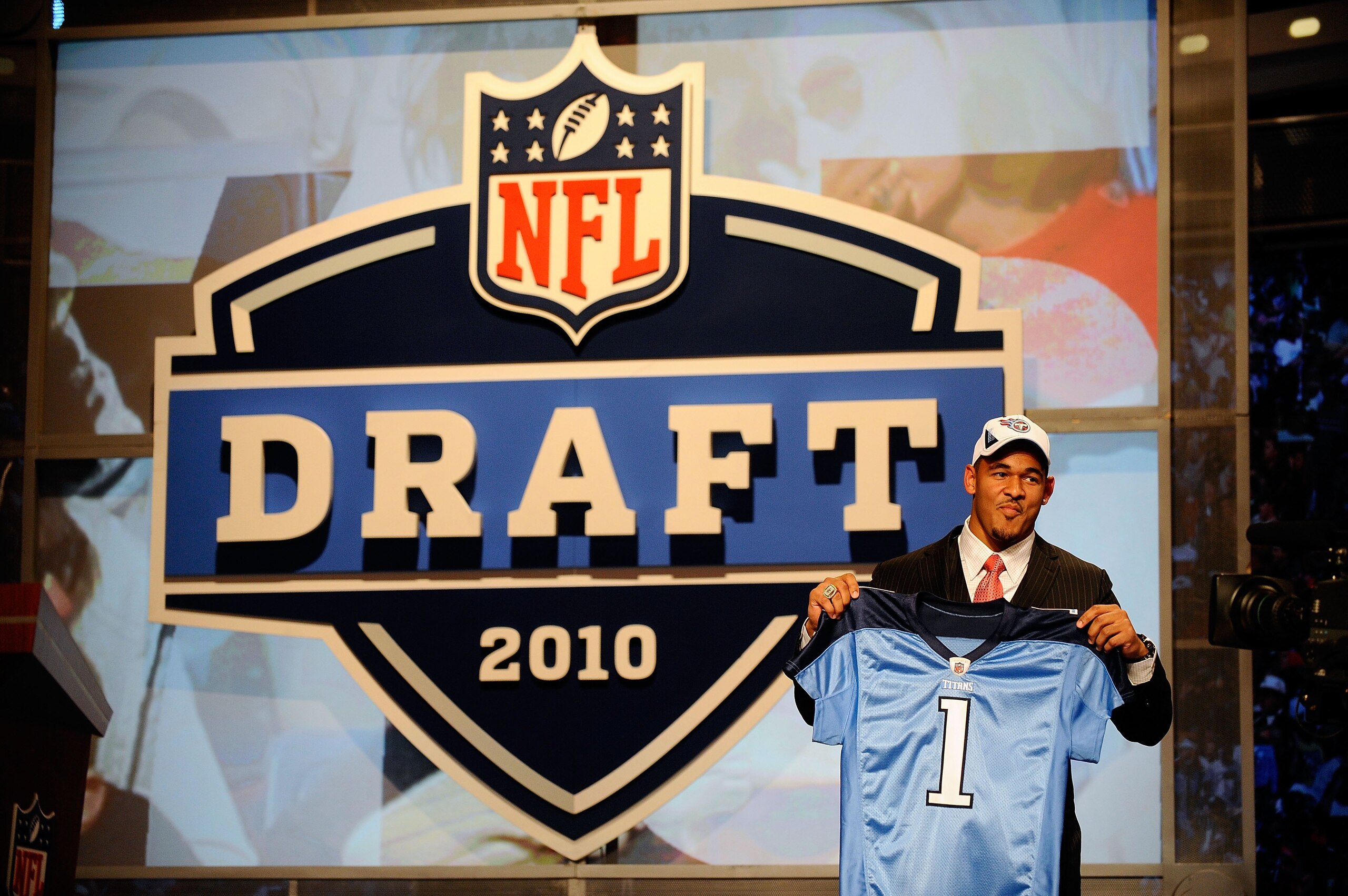 NEW YORK - APRIL 22: Derrick Morgan from the Georgia Tech Yellow Jackets holds up a Tennessee Titans jersey after the Titans selected Morgan number 16 overall during the first round of the 2010 NFL Draft at Radio City Music Hall on April 22, 2010 in New NEW YORK - APRIL 22: Derrick Morgan from the Georgia Tech Yellow Jackets holds up a Tennessee Titans jersey after the Titans selected Morgan number 16 overall during the first round of the 2010 NFL Draft at Radio City Music Hall on April 22, 2010 in New