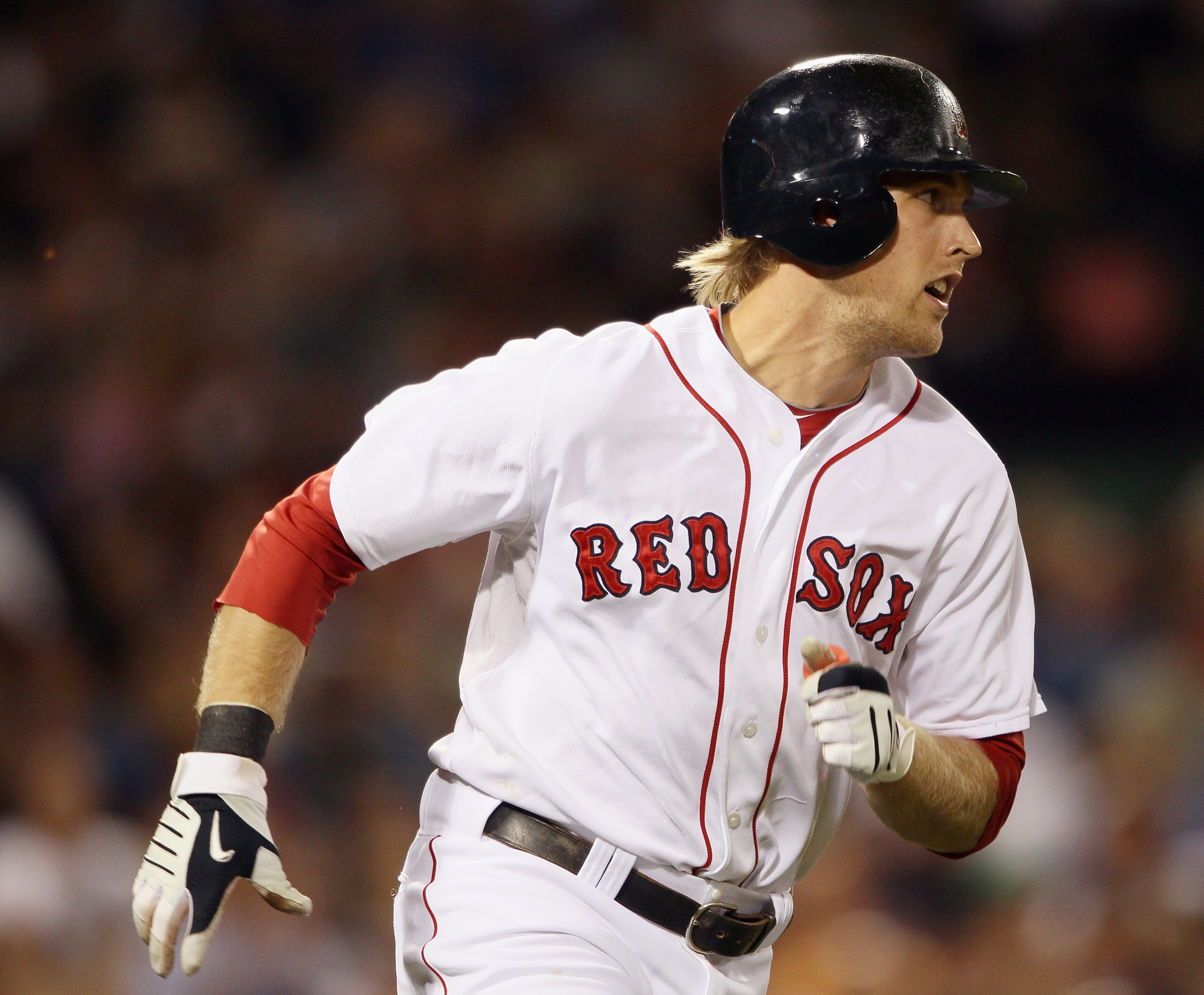 BOSTON - SEPTEMBER 08:  Lars Anderson #44  of the Boston Red Sox heads for first base after he hit his first MLB hit against the Tampa Bay Rays on September 8, 2010 at Fenway Park in Boston, Massachusetts.  (Photo by Elsa/Getty Images)