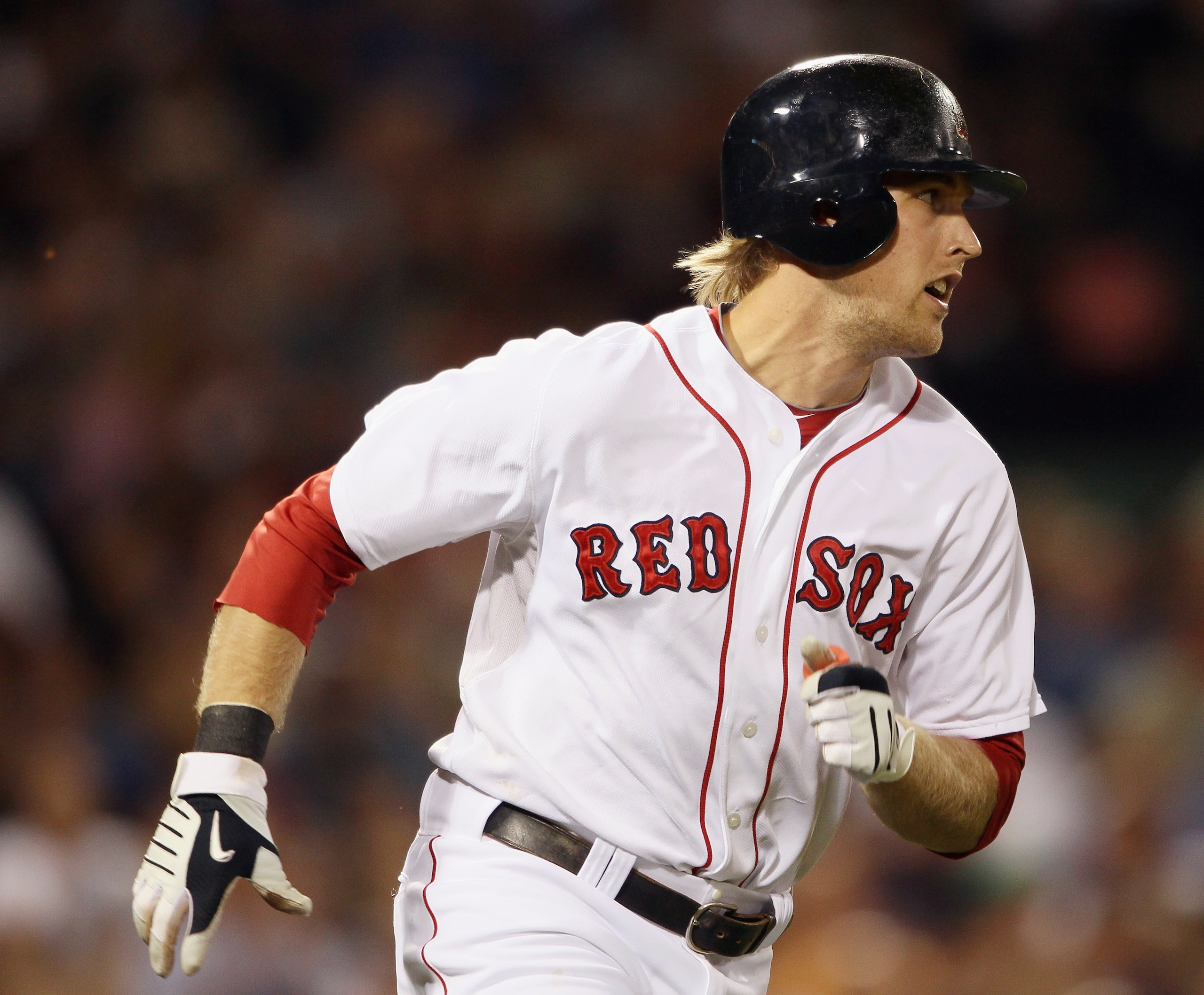BOSTON - SEPTEMBER 08:  Lars Anderson #44  of the Boston Red Sox heads for first base after he hit his first MLB hit against the Tampa Bay Rays on September 8, 2010 at Fenway Park in Boston, Massachusetts.  (Photo by Elsa/Getty Images)