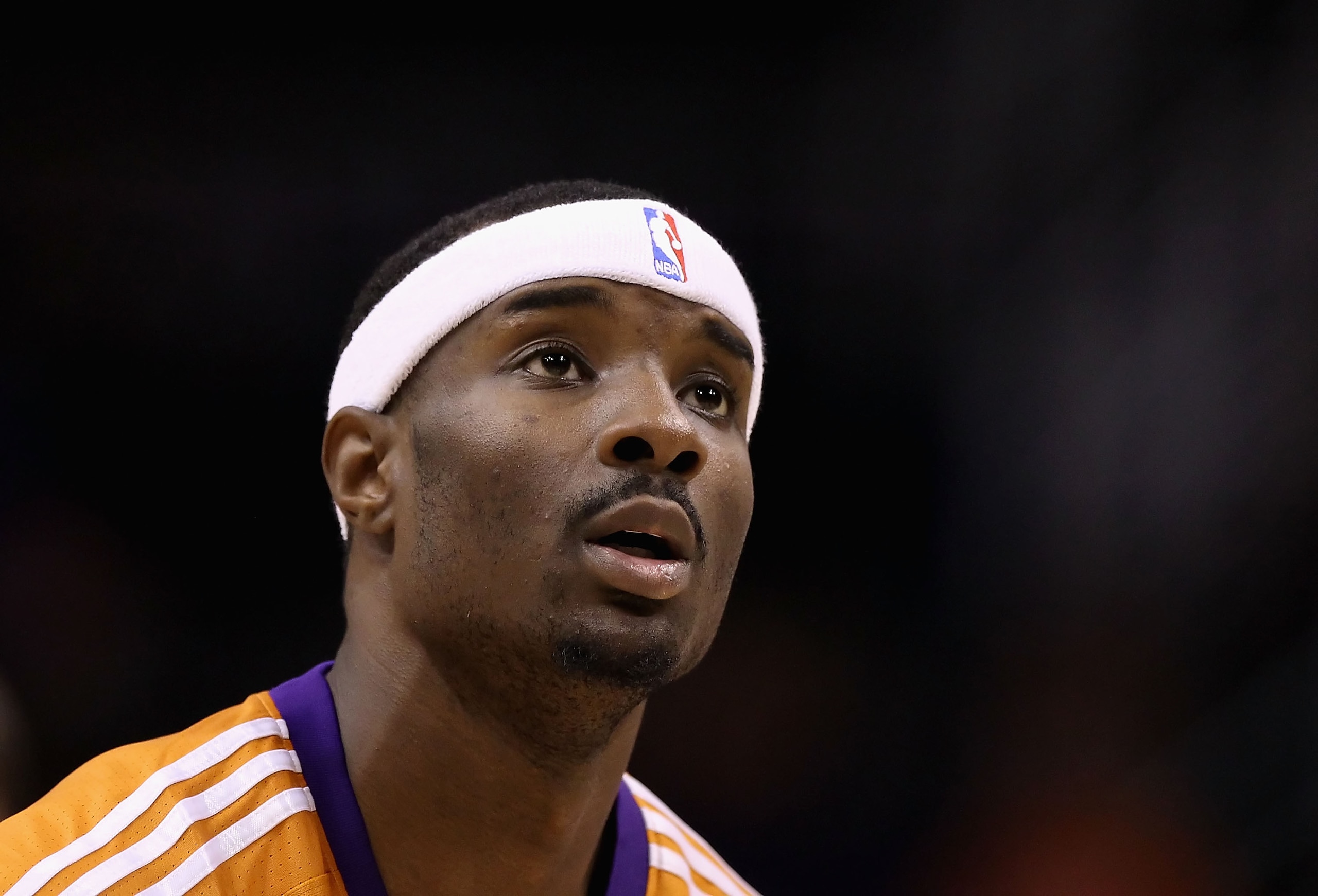 PHOENIX - OCTOBER 12:  Gani Lawal #31 of the Phoenix Suns warms up before the preseason NBA game against the Utah Jazz at US Airways Center on October 12, 2010 in Phoenix, Arizona. NOTE TO USER: User expressly acknowledges and agrees that, by downloading