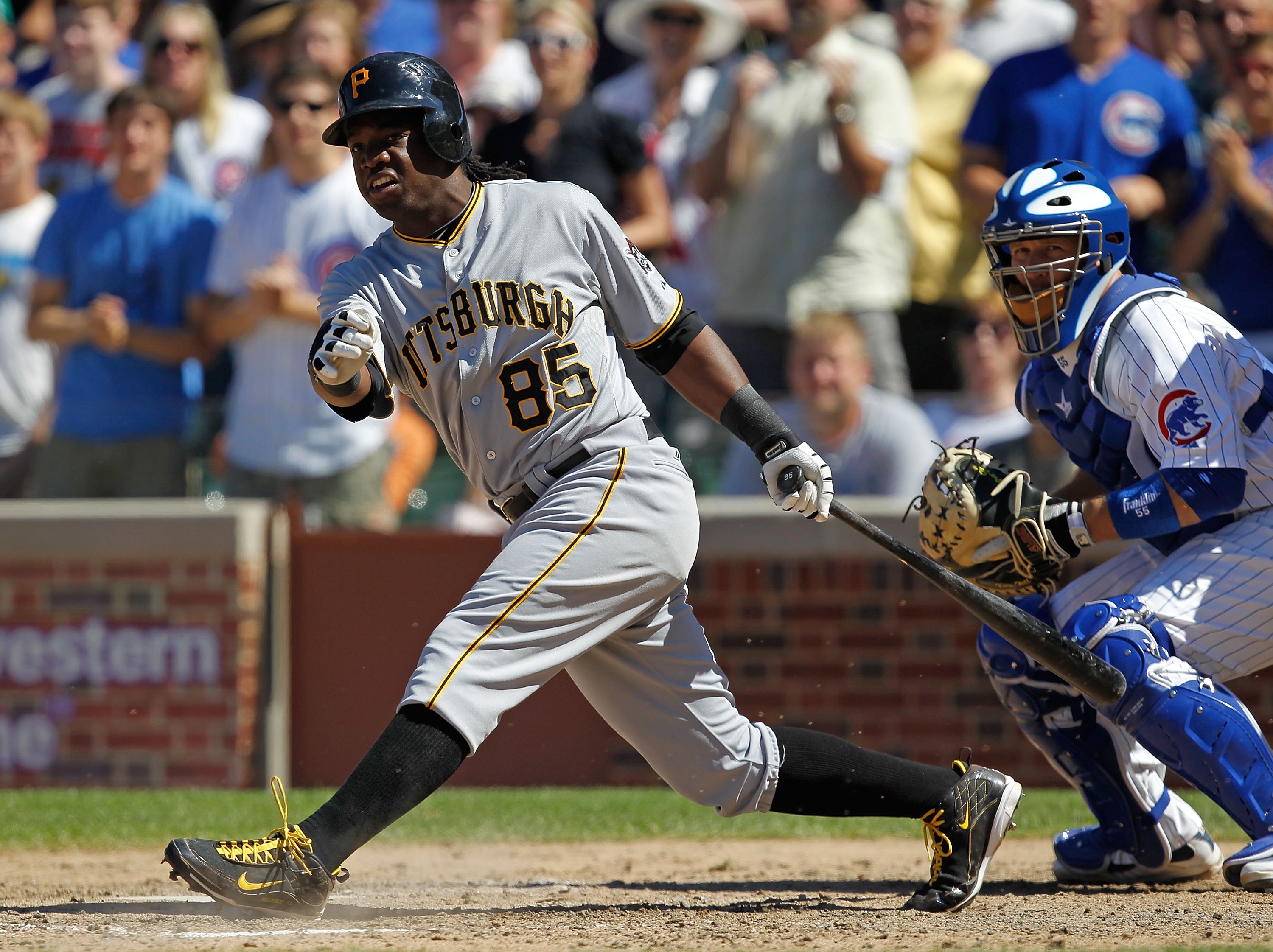 CHICAGO - JUNE 30: Lastings Milledge #85 of the Pittsburgh Pirates hits the ball against the Chicago Cubs at Wrigley Field on June 30, 2010 in Chicago, Illinois. The Pirates defeated the Cubs 2-0. (Photo by Jonathan Daniel/Getty Images)