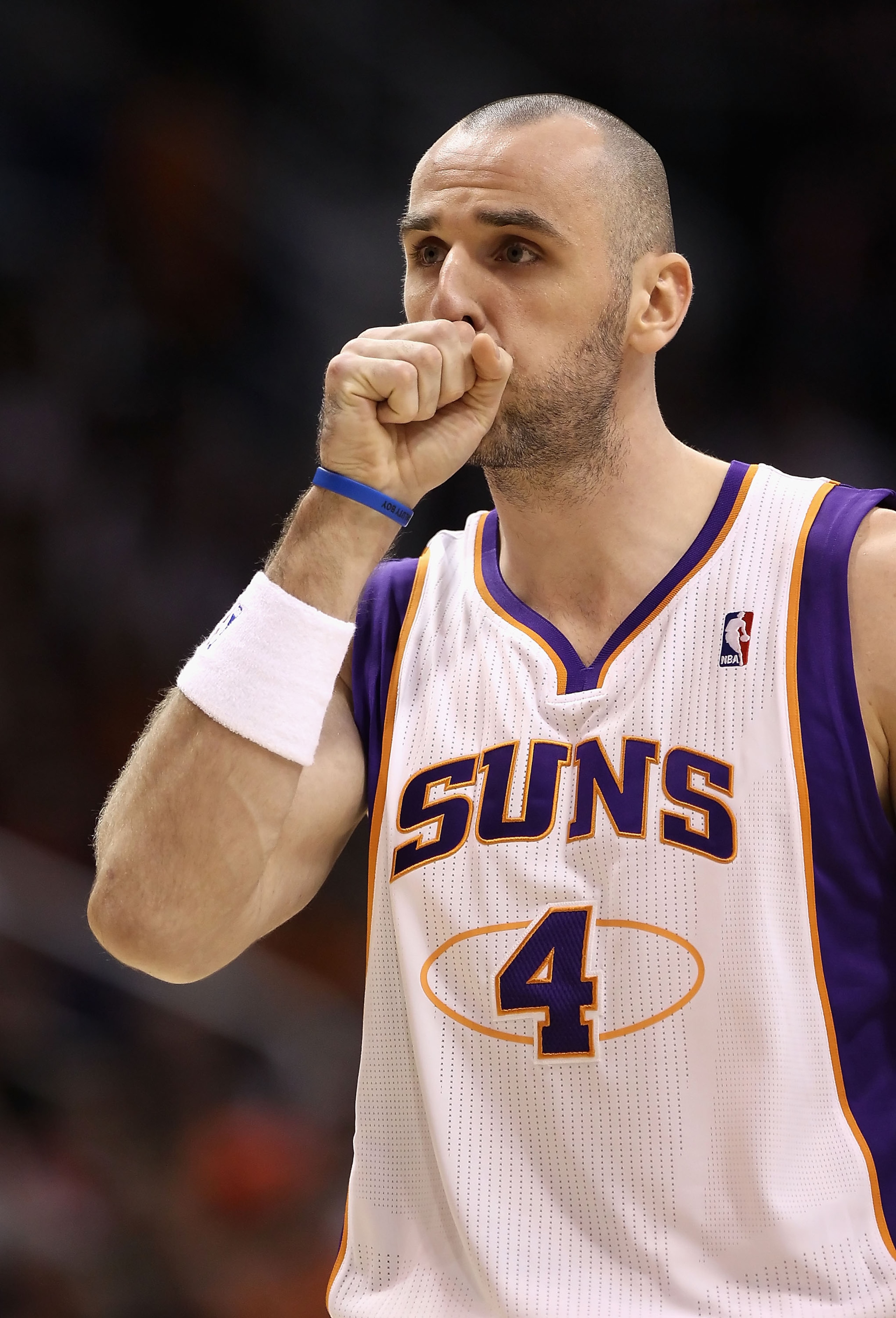 PHOENIX - DECEMBER 23:  Marcin Gortat #4 of the Phoenix Suns during the NBA game against the Miami Heat at US Airways Center on December 23, 2010 in Phoenix, Arizona.  The Heat defeated the Suns 95-83.  NOTE TO USER: User expressly acknowledges and agrees