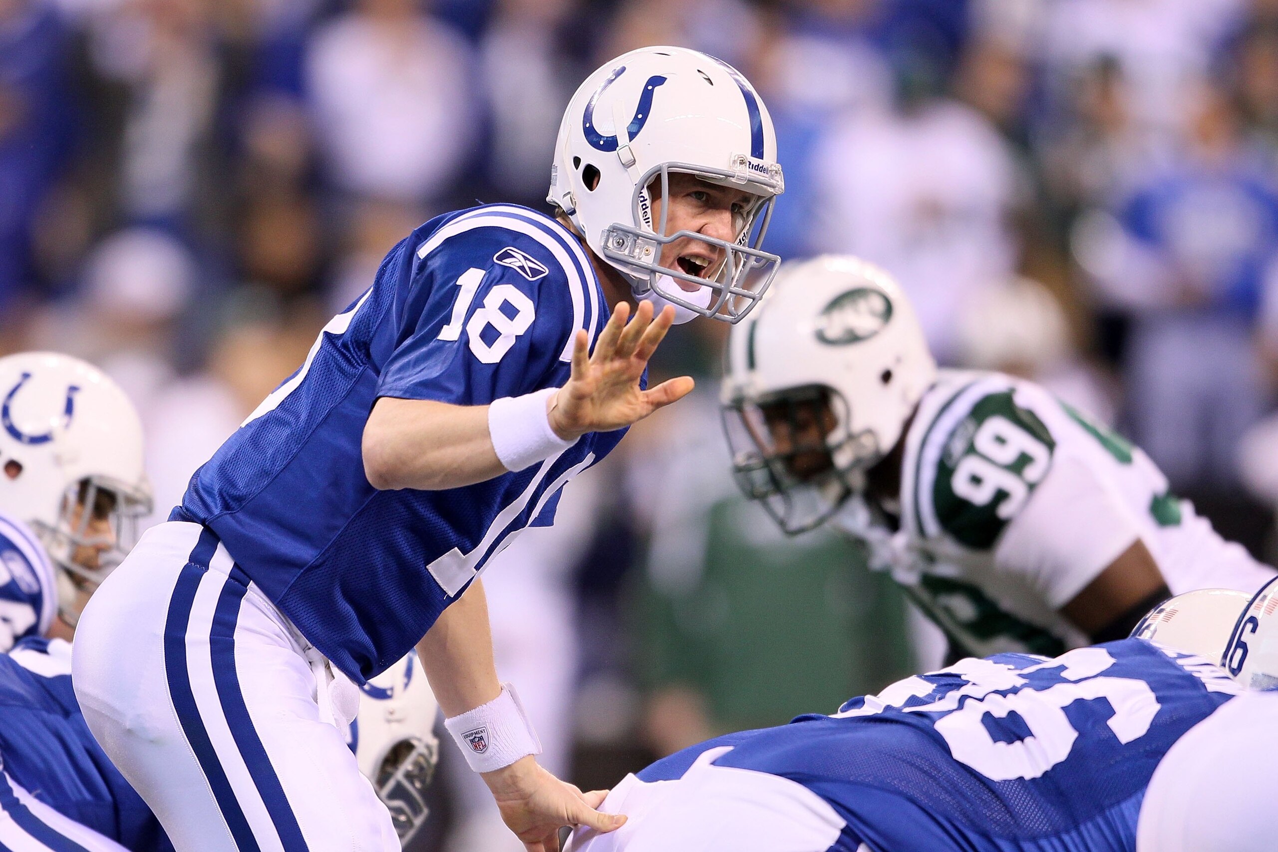 INDIANAPOLIS - JANUARY 24:  Quarterback Peyton Manning #18 of the Indianapolis Colts under center during the first half against the New York Jets during the AFC Championship Game at Lucas Oil Stadium on January 24, 2010 in Indianapolis, Indiana. The Colts