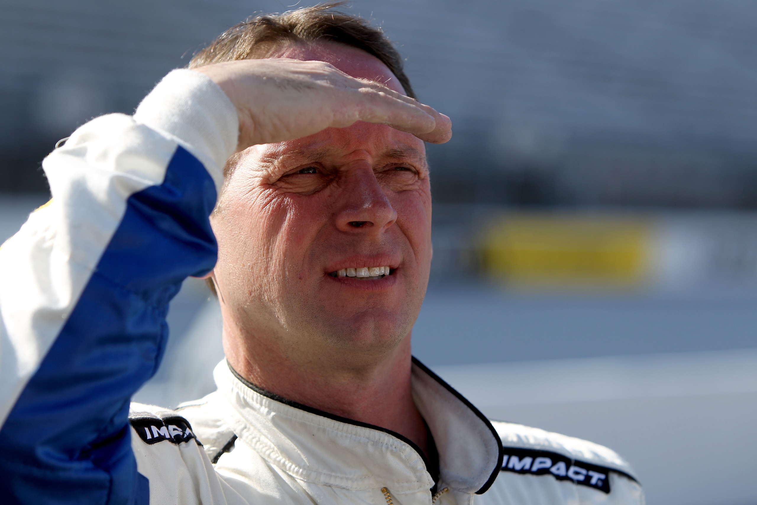 BRISTOL, TN - MARCH 19:  Dave Blaney, driver of the #66 PRISM Motorsports Toyota, stands in the garage area after qualifying for the NASCAR Sprint Cup Series Food City 500 at Bristol Motor Speedway on March 19, 2010 in Bristol, Tennessee.  (Photo by Doug