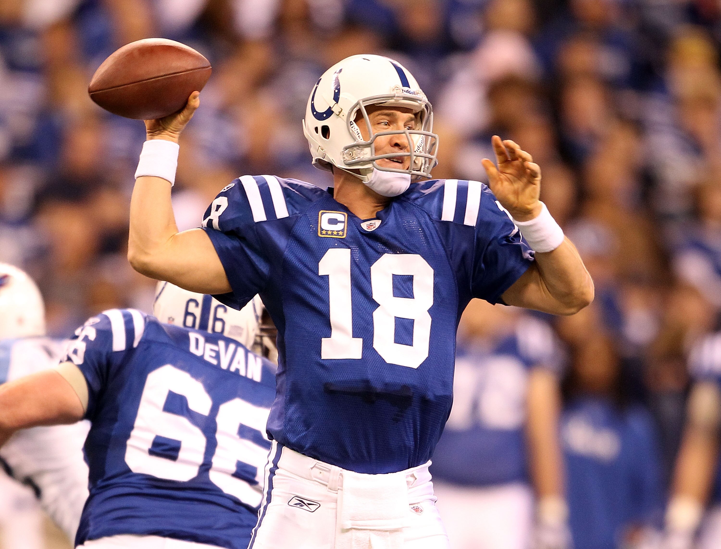 INDIANAPOLIS - JANUARY 02: Peyton Manning #18 of the Indianapolis Colts throws a pass during NFL game against the Tennessee Titans at Lucas Oil Stadium on January 2, 2011 in Indianapolis, Indiana.  (Photo by Andy Lyons/Getty Images)