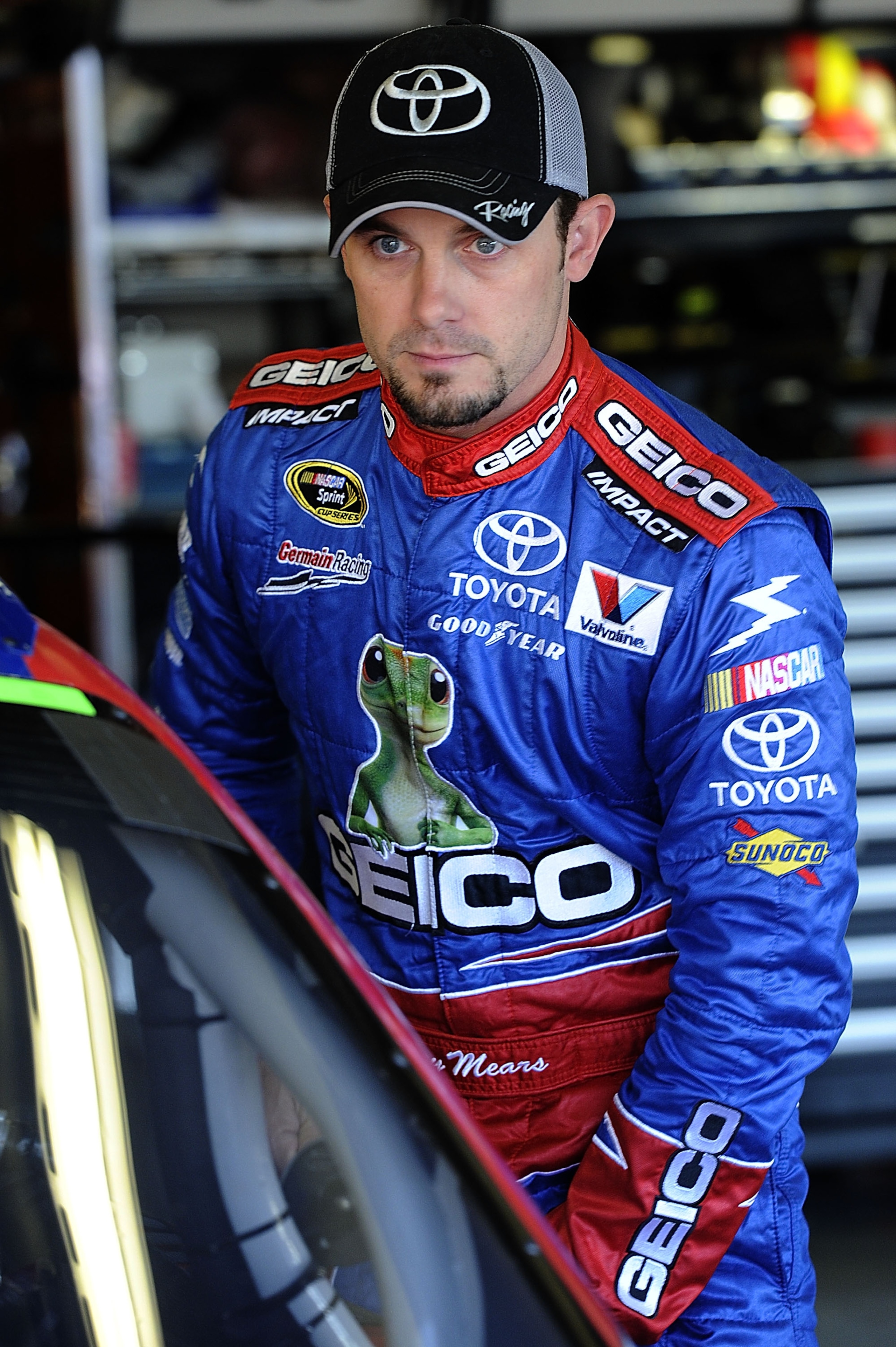 FORT WORTH, TX - NOVEMBER 06:  Casey Mears, driver of the #13 GEICO Toyota, stands in the garage area during practice for the NASCAR Sprint Cup Series AAA Texas 500 at Texas Motor Speedway on November 6, 2010 in Fort Worth, Texas.  (Photo by John Harrelso
