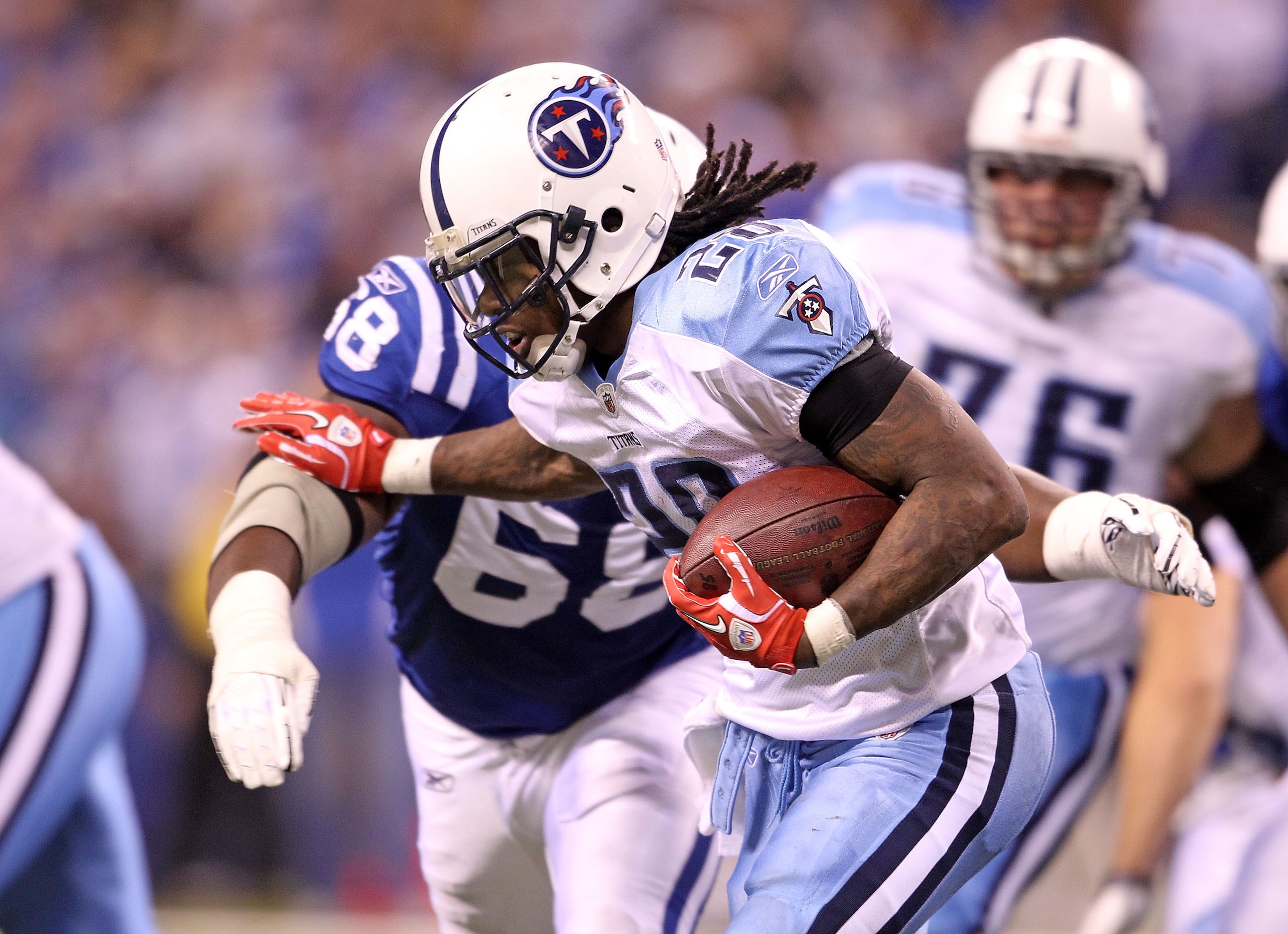 INDIANAPOLIS - JANUARY 02: Chris Johnson #28 of the Tennessee Titans is tackled by Eric Foster #68 of the Indianapolis Colts at Lucas Oil Stadium on January 2, 2011 in Indianapolis, Indiana. the Colts won 23-20. (Photo by Andy Lyons/Getty Images) INDIANAPOLIS - JANUARY 02: Chris Johnson #28 of the Tennessee Titans is tackled by Eric Foster #68 of the Indianapolis Colts at Lucas Oil Stadium on January 2, 2011 in Indianapolis, Indiana. the Colts won 23-20. (Photo by Andy Lyons/Getty Images)