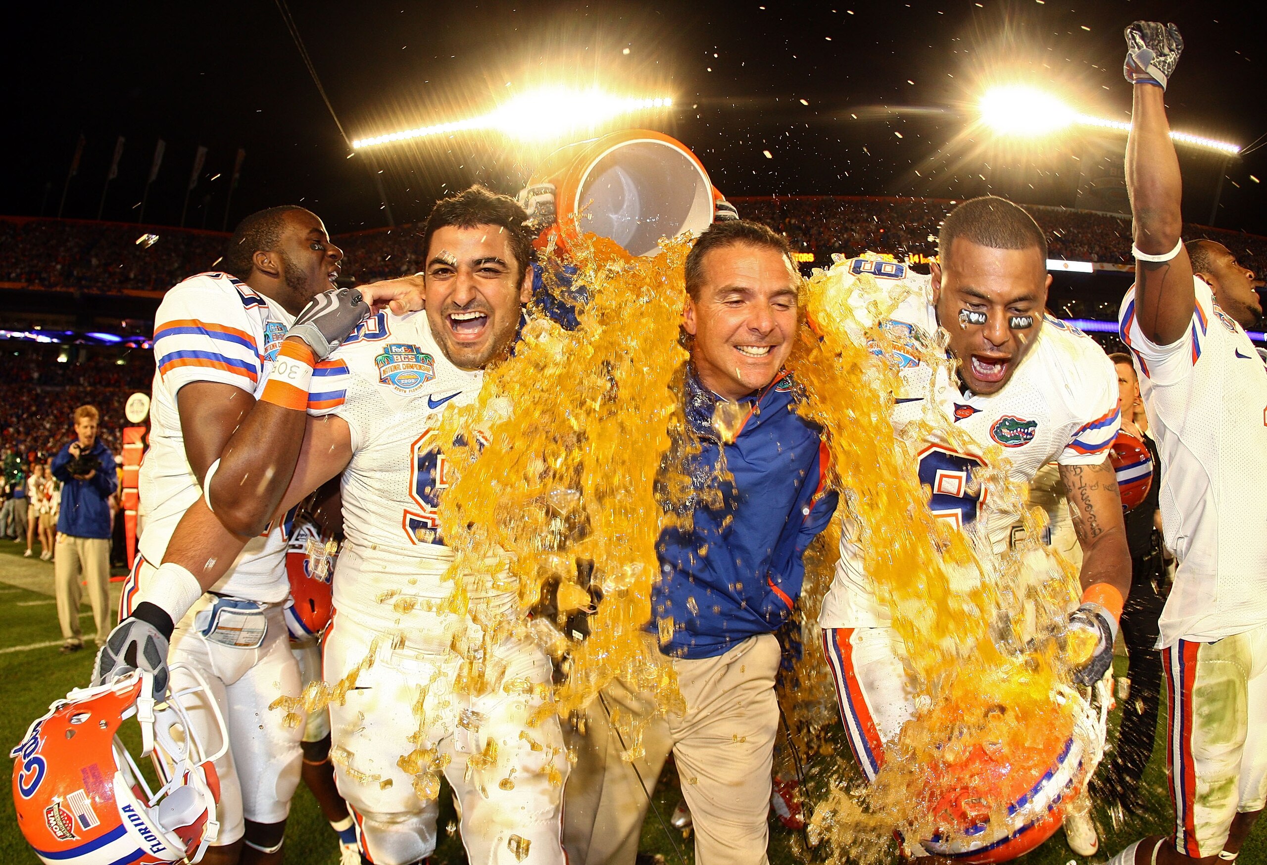 MIAMI - JANUARY 08:  Head coach Urban Meyer of the Florida Gators gets gatorade dumped on him by his teammates towards the end of the game against the Oklahoma Sooners in the FedEx BCS National Championship Game at Dolphin Stadium on January 8, 2009 in Mi
