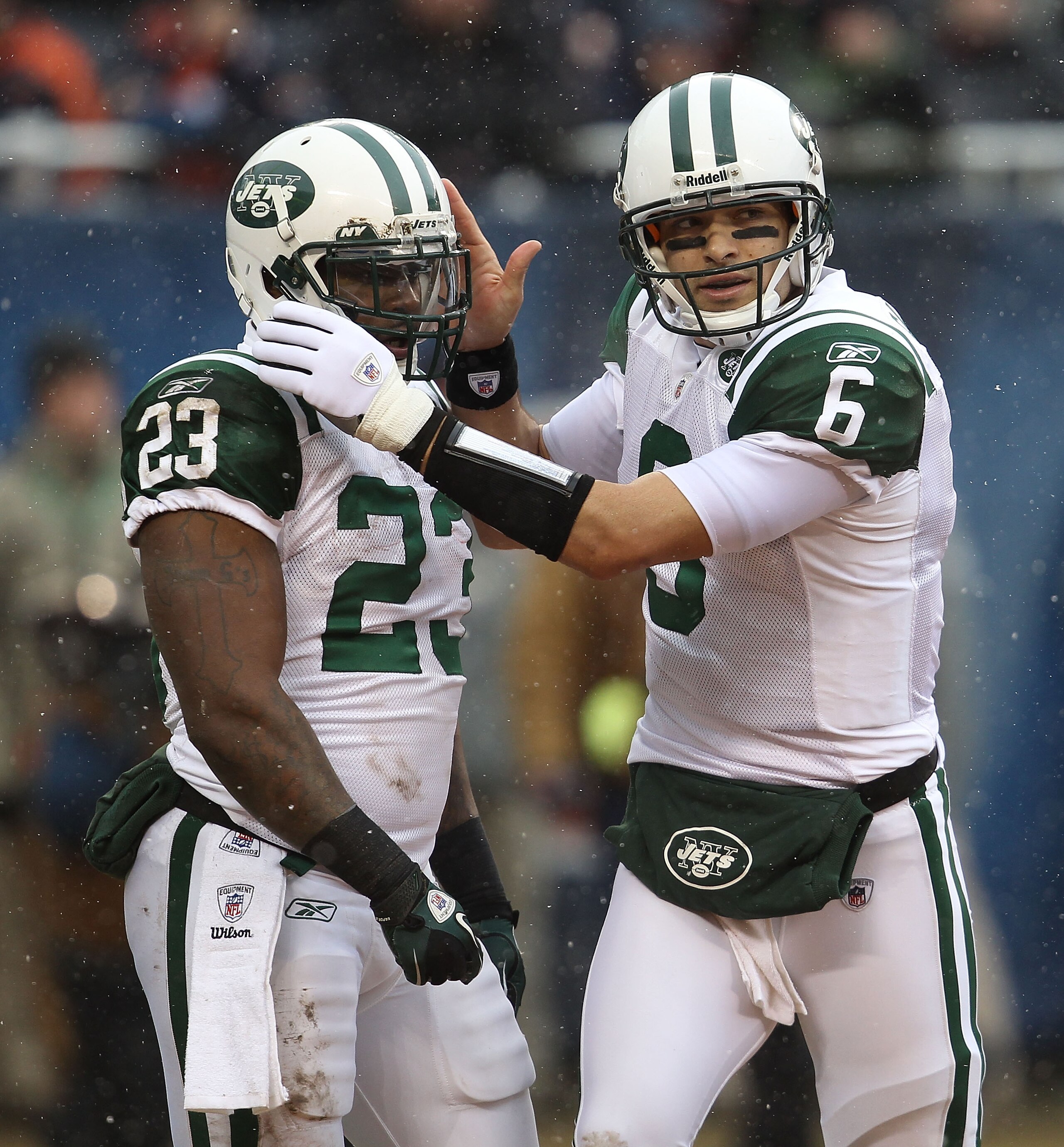CHICAGO, IL - DECEMBER 26: Mark Sanchez #6 of the New York Jets congratulates Shonn Greene #23 after a touchdown against the Chicago Bears at Soldier Field on December 26, 2010 in Chicago, Illinois. The Bears defeated the Jets 38-34. (Photo by Jonathan Da