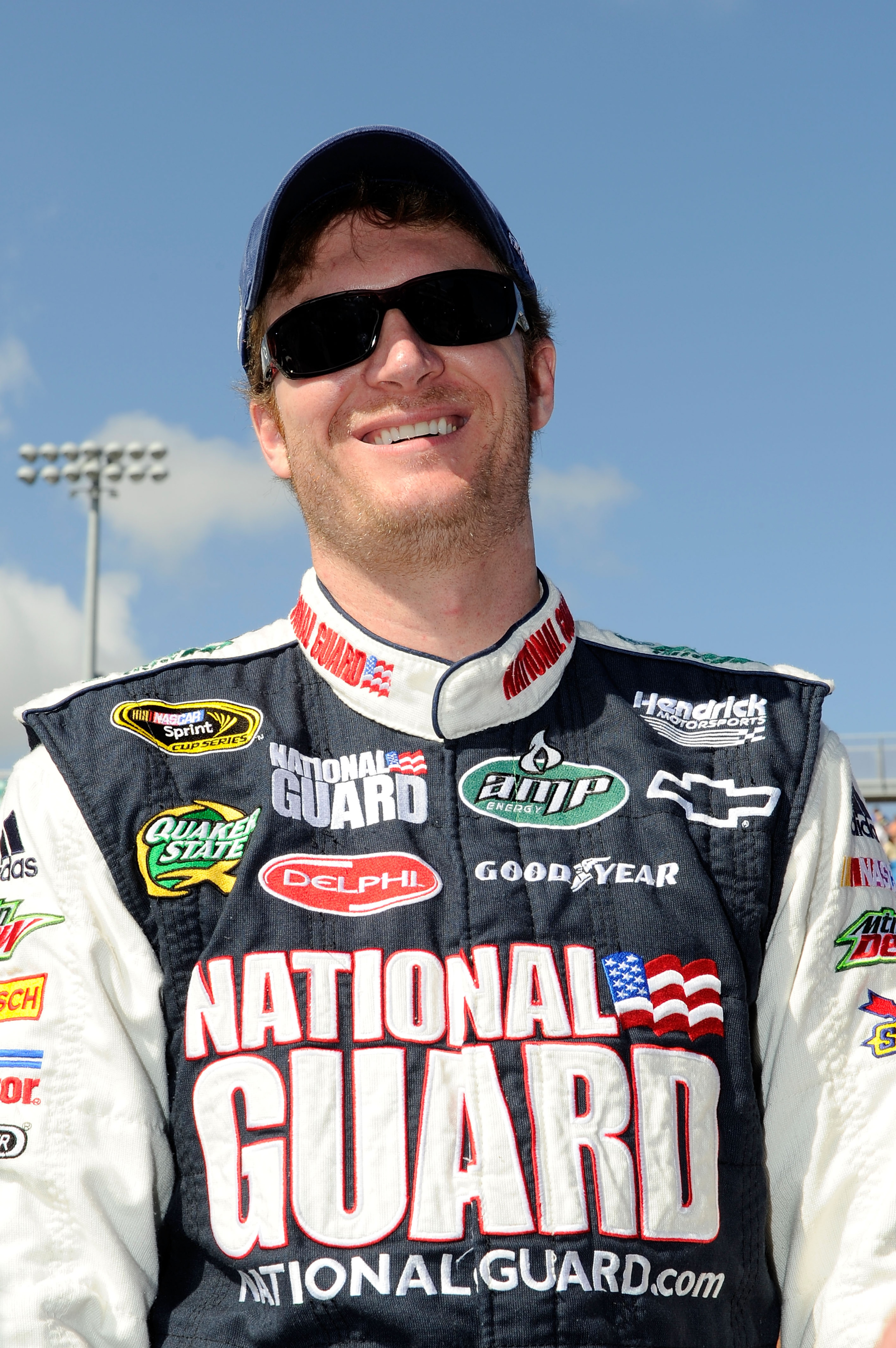 HOMESTEAD, FL - NOVEMBER 21:  Dale Earnhardt Jr., driver of the #88 National Guard/AMP Energy Chevrolet, stands on pit road prior to the NASCAR Sprint Cup Series Ford 400 at Homestead-Miami Speedway on November 21, 2010 in Homestead, Florida.  (Photo by J