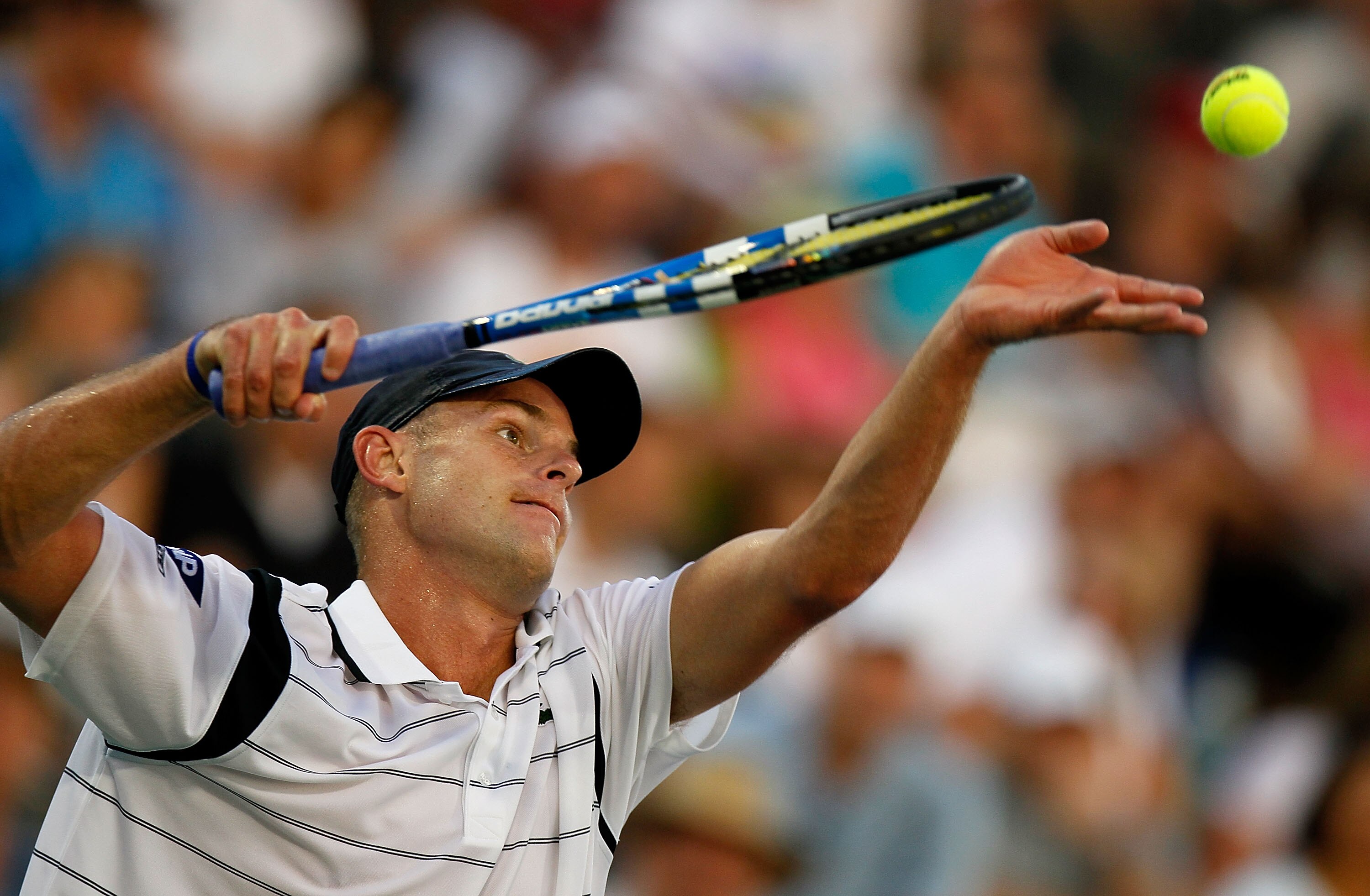ATLANTA - JULY 23:  Andy Roddick serves to Xavier Malisse of Belgium on Day 5 of the Atlanta Tennis Championships at the Atlanta Athletic Club on July 23, 2010 in Atlanta, Georgia.  (Photo by Kevin C. Cox/Getty Images)