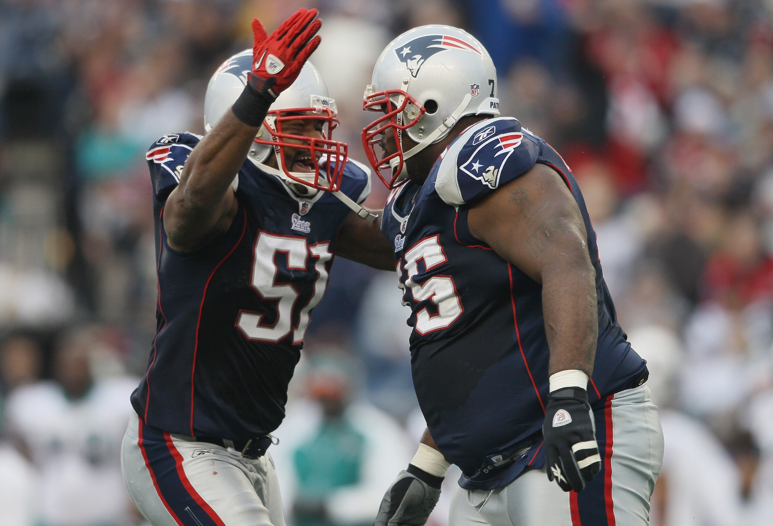 FOXBORO, MA - JANUARY 02: Jerod Mayo #51 of the New England Patriots congratulates Vince Wilfork #75 in the second half against the Miami Dolphins on January 2, 2011 at Gillette Stadium in Foxboro, Massachusetts. (Photo by Elsa/Getty Images) FOXBORO, MA - JANUARY 02: Jerod Mayo #51 of the New England Patriots congratulates Vince Wilfork #75 in the second half against the Miami Dolphins on January 2, 2011 at Gillette Stadium in Foxboro, Massachusetts. (Photo by Elsa/Getty Images)