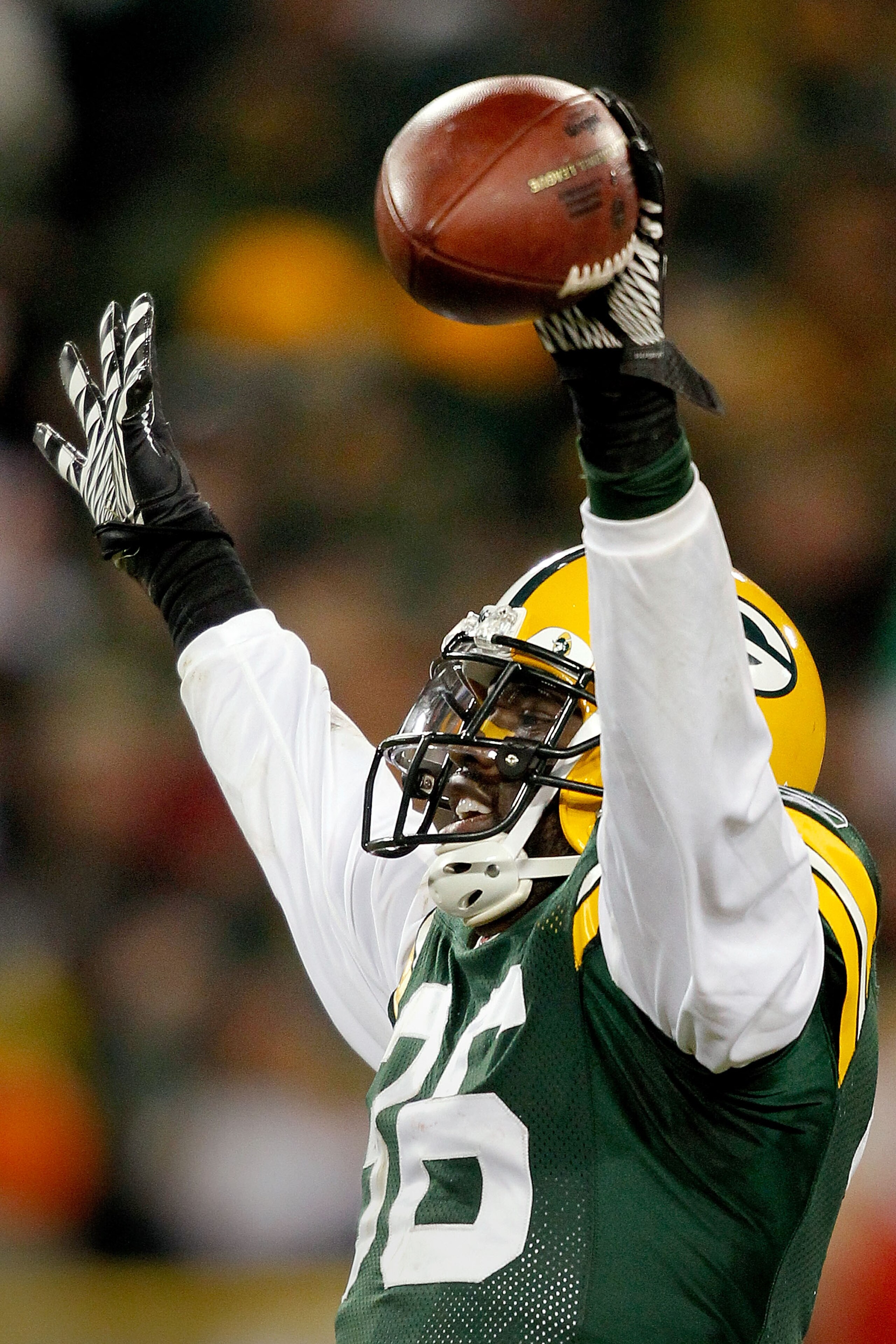 GREEN BAY, WI - JANUARY 02: Nick Collins #36 of the Green Bay Packers celebrates making a interception against the Chicago Bears to end their final drive in the fourth quarter at Lambeau Field on January 2, 2011 in Green Bay, Wisconsin.  (Photo by Matthew
