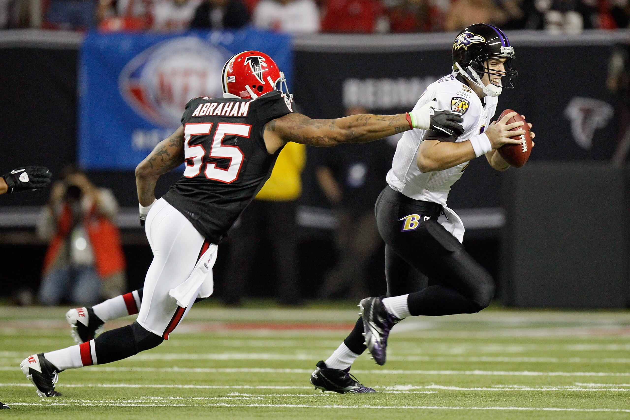 ATLANTA - NOVEMBER 11: John Abraham #55 of the Atlanta Falcons pressures quarterback Joe Flacco #5 of the Baltimore Ravens at Georgia Dome on November 11, 2010 in Atlanta, Georgia. (Photo by Kevin C. Cox/Getty Images) ATLANTA - NOVEMBER 11: John Abraham #55 of the Atlanta Falcons pressures quarterback Joe Flacco #5 of the Baltimore Ravens at Georgia Dome on November 11, 2010 in Atlanta, Georgia. (Photo by Kevin C. Cox/Getty Images)