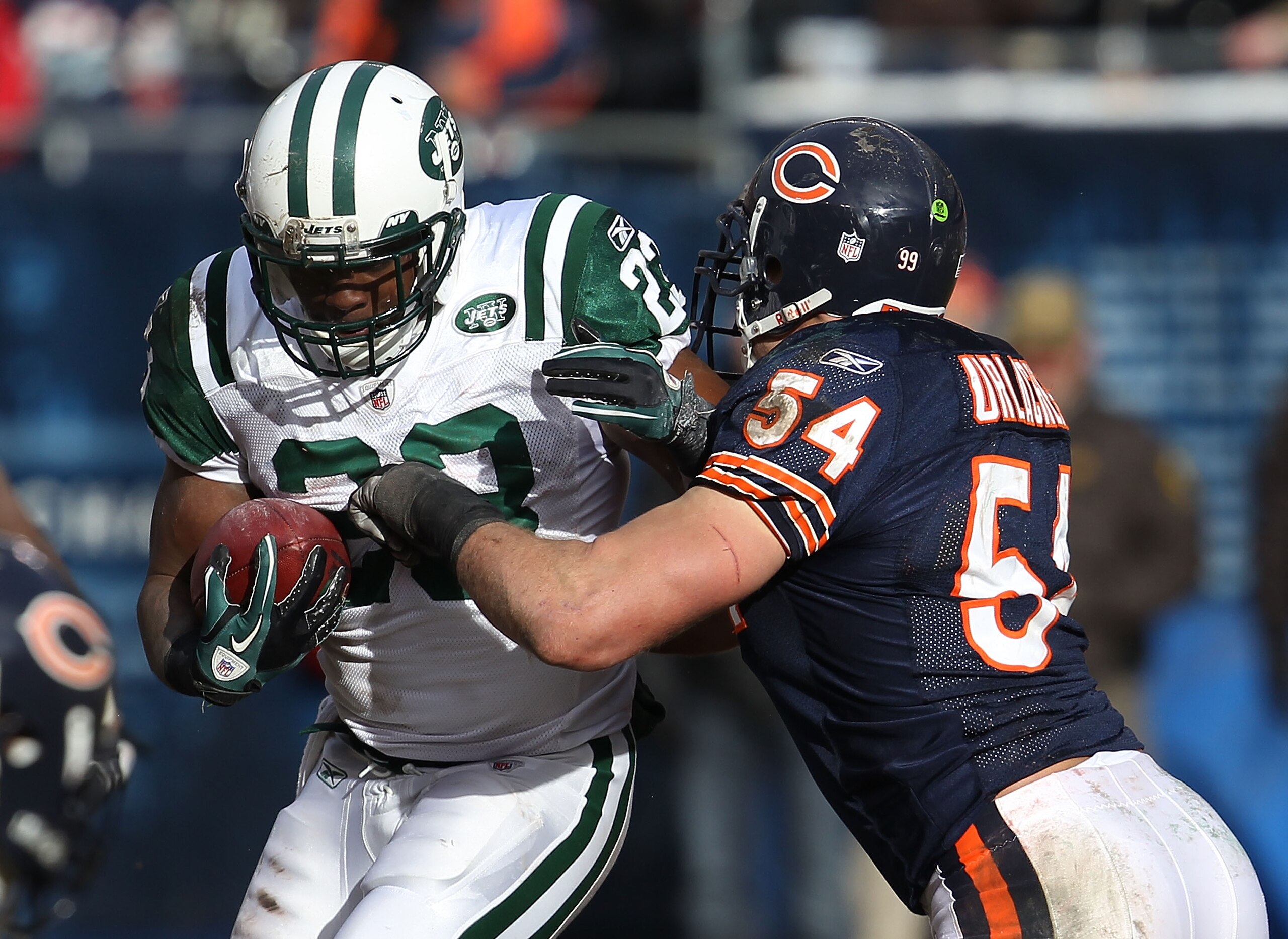 CHICAGO, IL - DECEMBER 26: Brian Urlacher #54 of the Chicago Bears brings down Shonn Greene #23 the New York Jets at Soldier Field on December 26, 2010 in Chicago, Illinois. The Bears defeated the Jets 38-34. (Photo by Jonathan Daniel/Getty Images) CHICAGO, IL - DECEMBER 26: Brian Urlacher #54 of the Chicago Bears brings down Shonn Greene #23 the New York Jets at Soldier Field on December 26, 2010 in Chicago, Illinois. The Bears defeated the Jets 38-34. (Photo by Jonathan Daniel/Getty Images)
