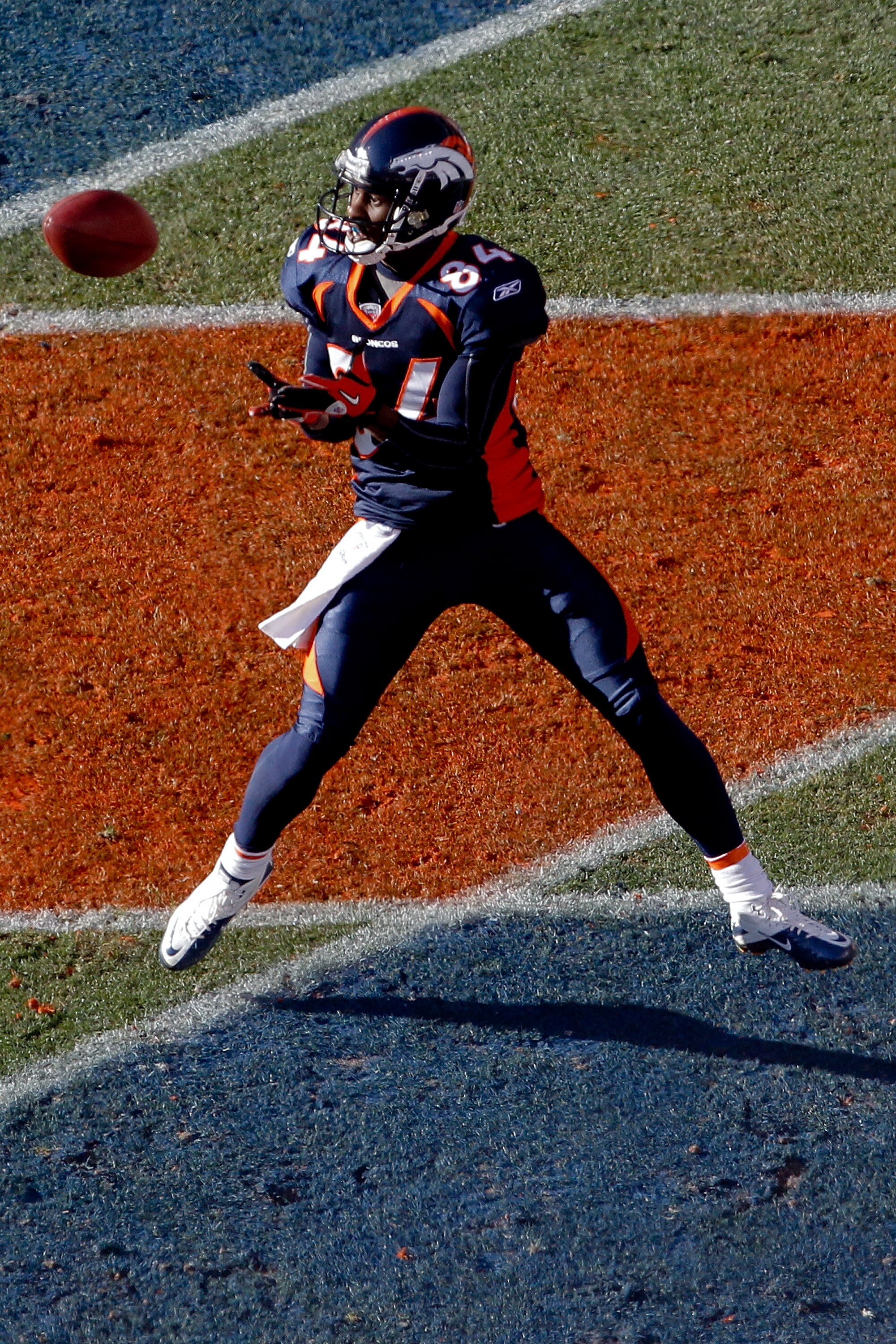 DENVER, CO - JANUARY 2:  Wide receiver Brandon Lloyd #84 of the Denver Broncos makes a touchdown reception against the San Diego Chargers during the first quarter at INVESCO Field at Mile High on January 2, 2011 in Denver, Colorado. (Photo by Justin Edmon