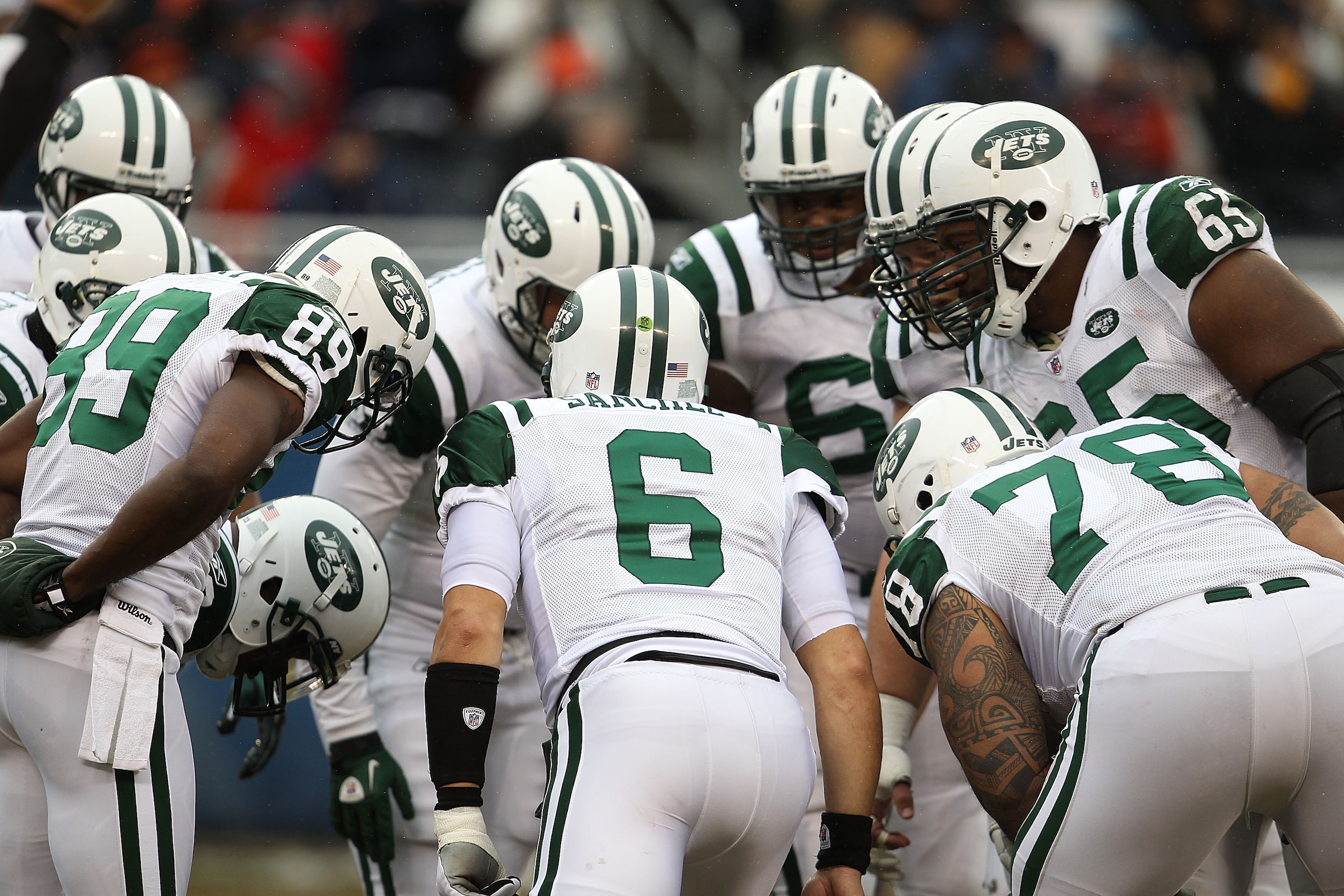 CHICAGO, IL - DECEMBER 26: Mark Sanchez #6 of the New York Jets calls a play in the huddle against the Chicago Bears at Soldier Field on December 26, 2010 in Chicago, Illinois. The Bears defeated the Jets 38-34. (Photo by Jonathan Daniel/Getty Images) CHICAGO, IL - DECEMBER 26: Mark Sanchez #6 of the New York Jets calls a play in the huddle against the Chicago Bears at Soldier Field on December 26, 2010 in Chicago, Illinois. The Bears defeated the Jets 38-34. (Photo by Jonathan Daniel/Getty Images)