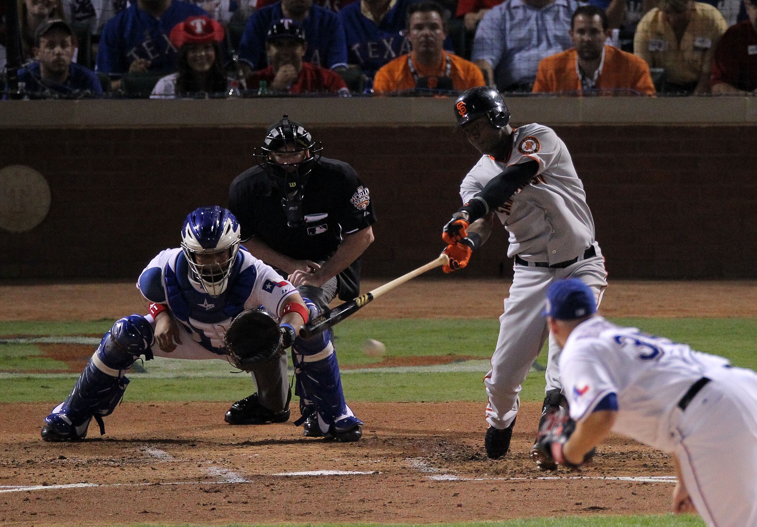 ARLINGTON, TX - OCTOBER 31: Edgar Renteria #16 of the San Francisco Giants loses his bat as he hits a ball foul in the second inning in Game Four of the 2010 MLB World Series at Rangers Ballpark in Arlington on October 31, 2010 in Arlington, Texas. (Pho ARLINGTON, TX - OCTOBER 31: Edgar Renteria #16 of the San Francisco Giants loses his bat as he hits a ball foul in the second inning in Game Four of the 2010 MLB World Series at Rangers Ballpark in Arlington on October 31, 2010 in Arlington, Texas. (Pho